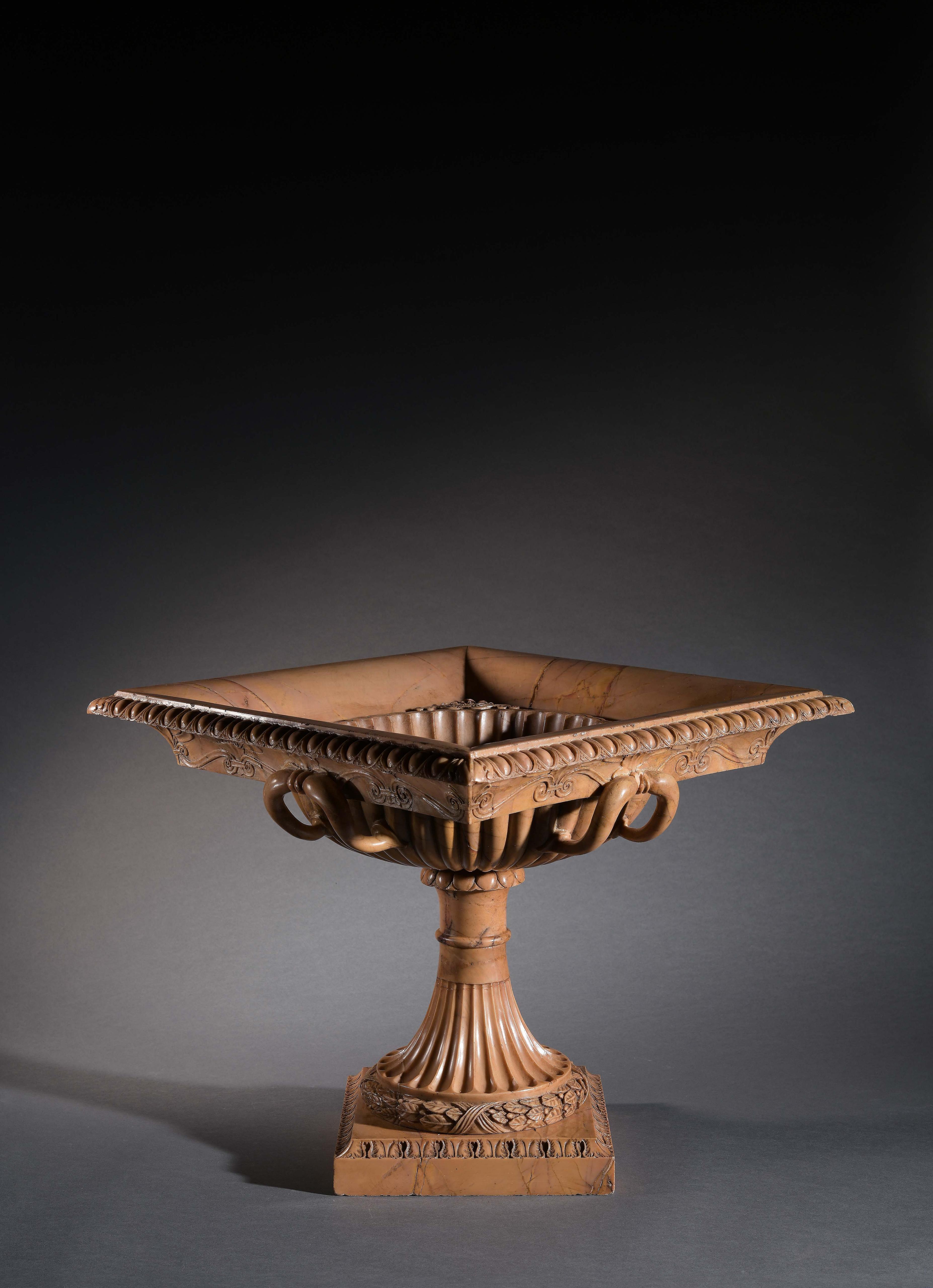 Attributed to Benedetto Boschetti, circa 1820-30. 
A superb Giallo Antico Tazza. The bowl, of square section, features an everted rim adorned with a finely carved egg-and-dart motif, beneath which runs an exceptionally executed foliate frieze.
The