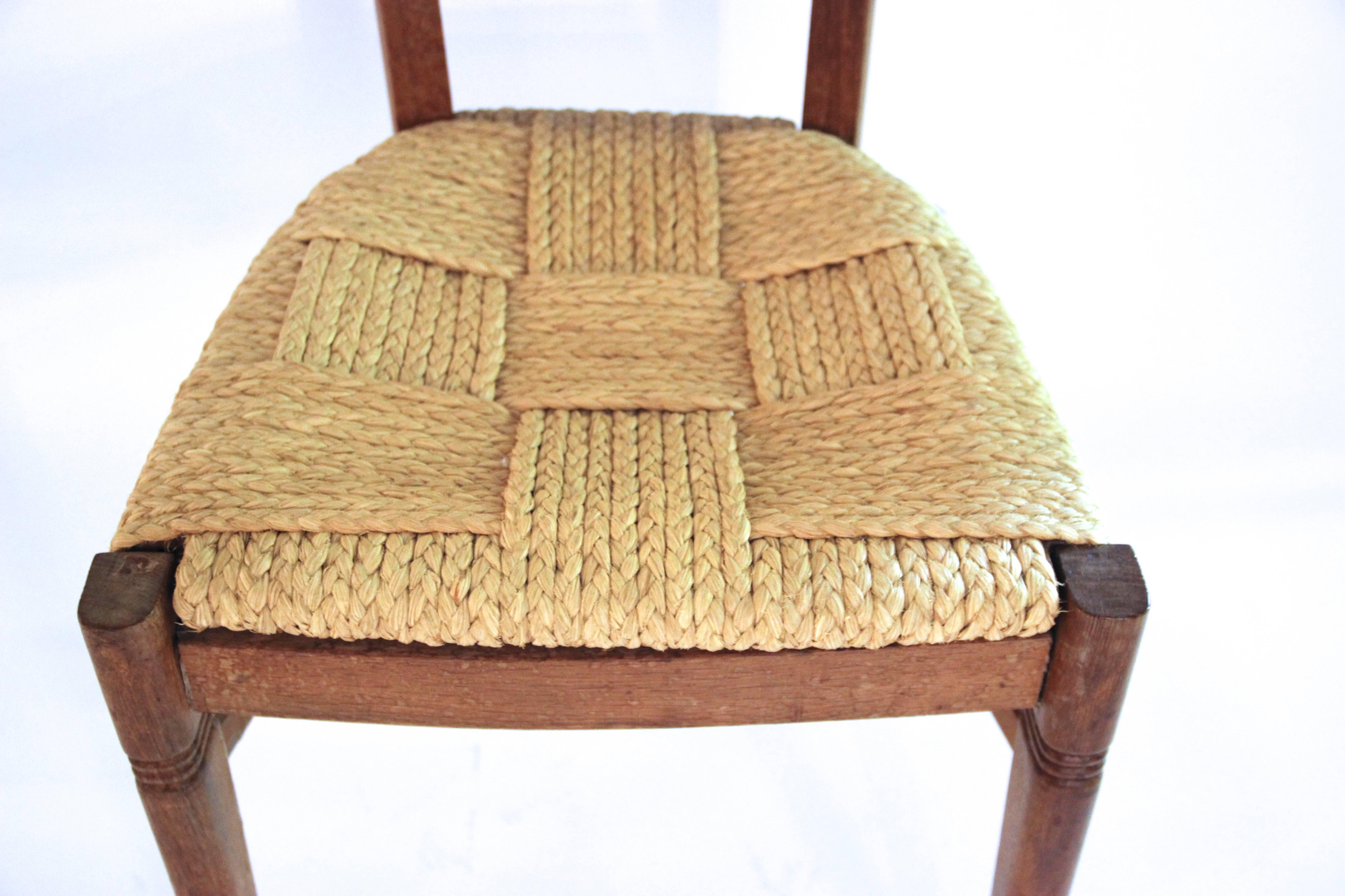 Audoux-Minet,
Suite of four chairs.
Rattan and wood,
circa 1970, France.
Measures: Height 110 cm, seat height 45 cm, width 45 cm, depth 43 cm.