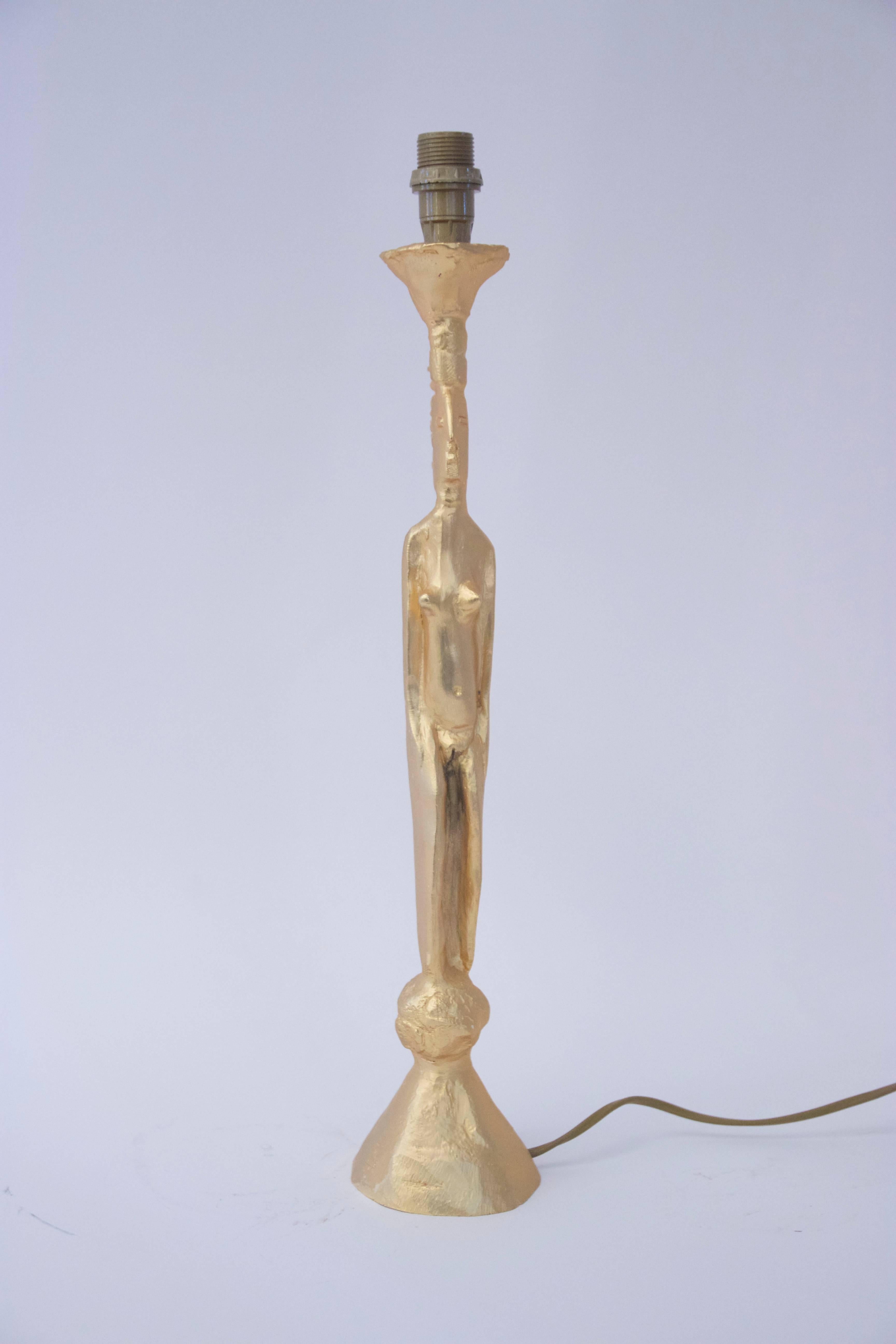 Pierre Casenove,
TOTEM table lamp,
gilded bronze,
circa 1970, France.
Measures: Height 55 cm, diameter 10 cm.
  