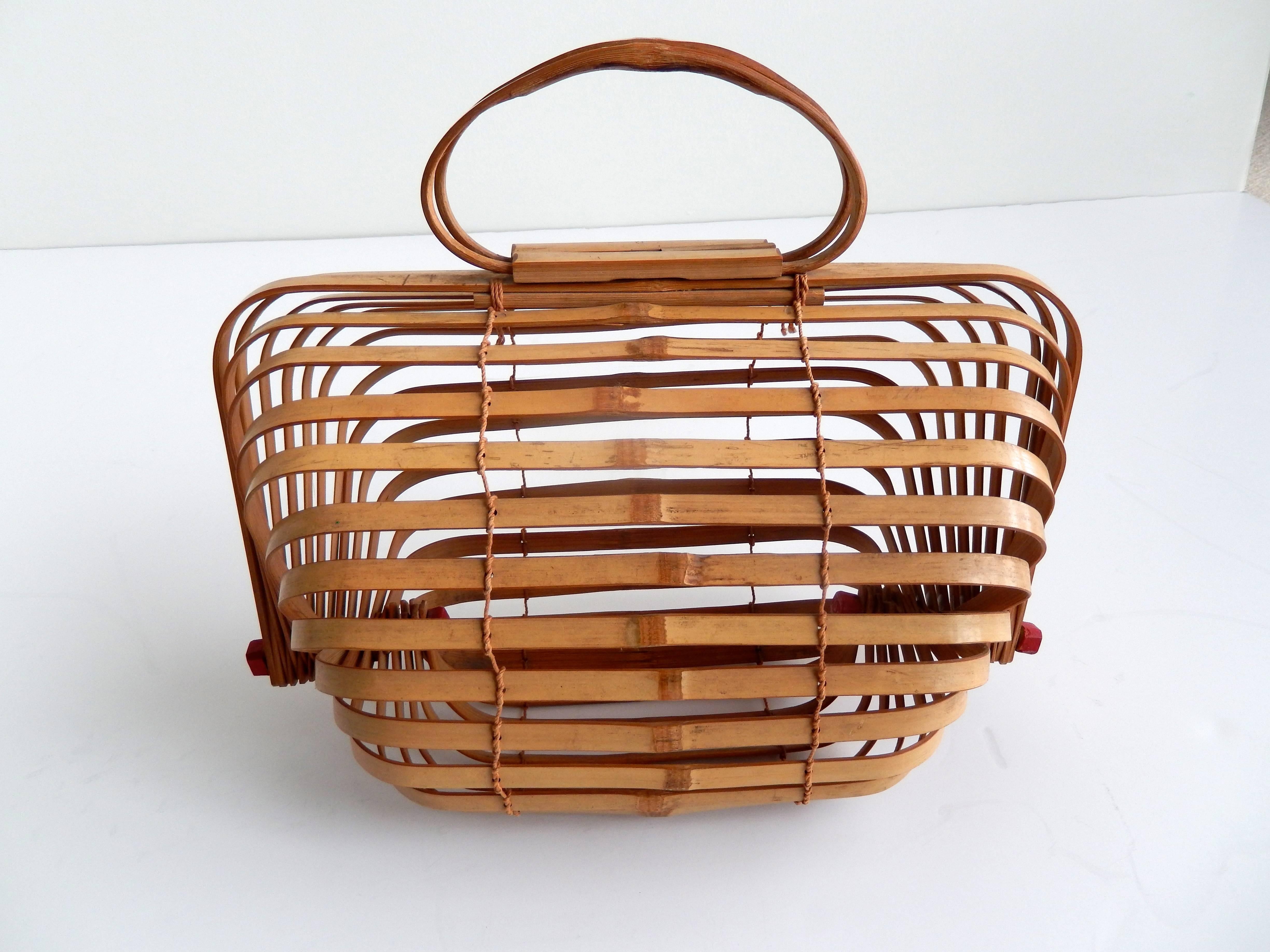 A sculptural, folding bamboo bag from Japan marked 