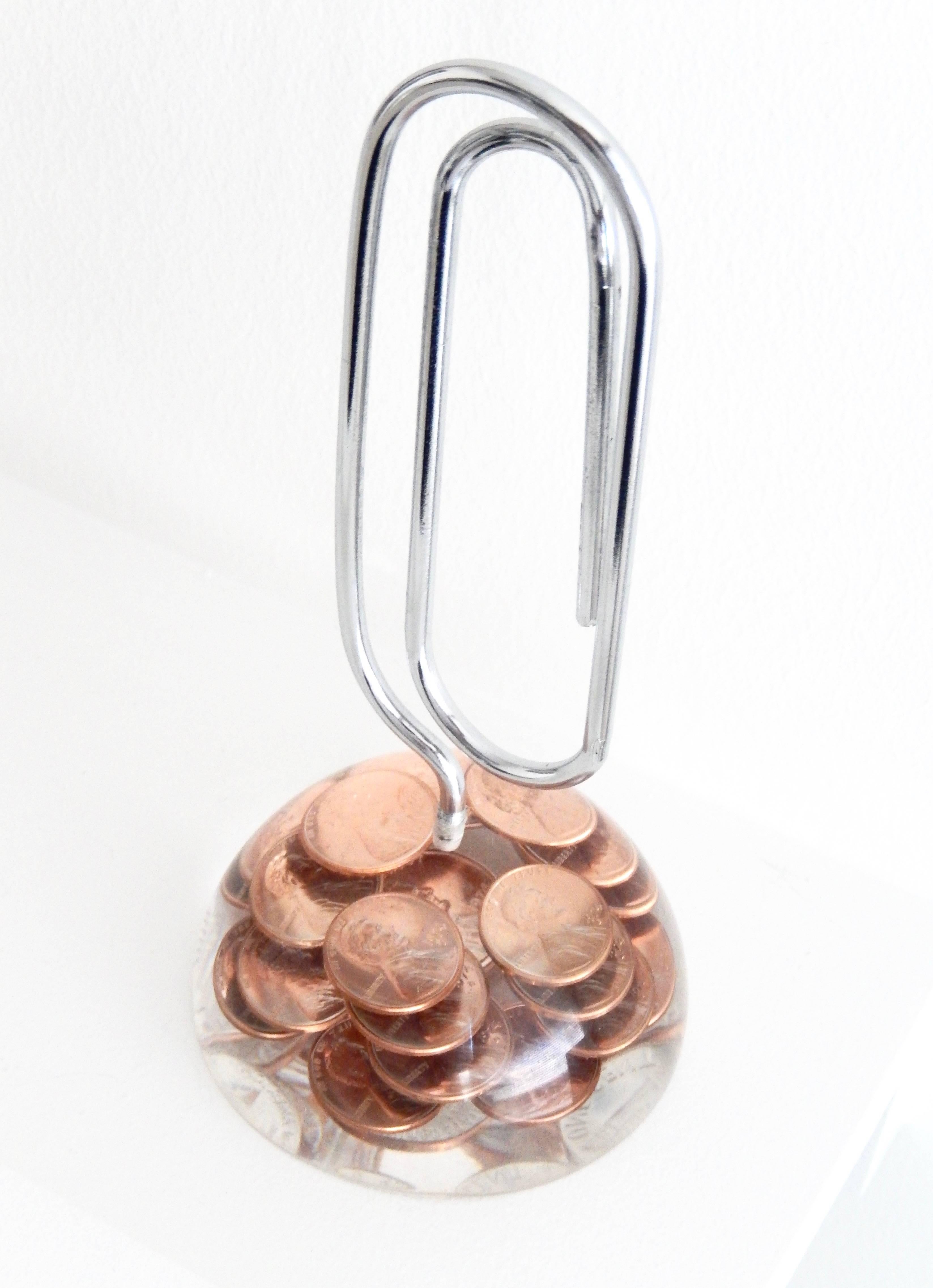 Modern 1974 Large Chrome Paper Clip with Pennies/Lucite Base For Sale
