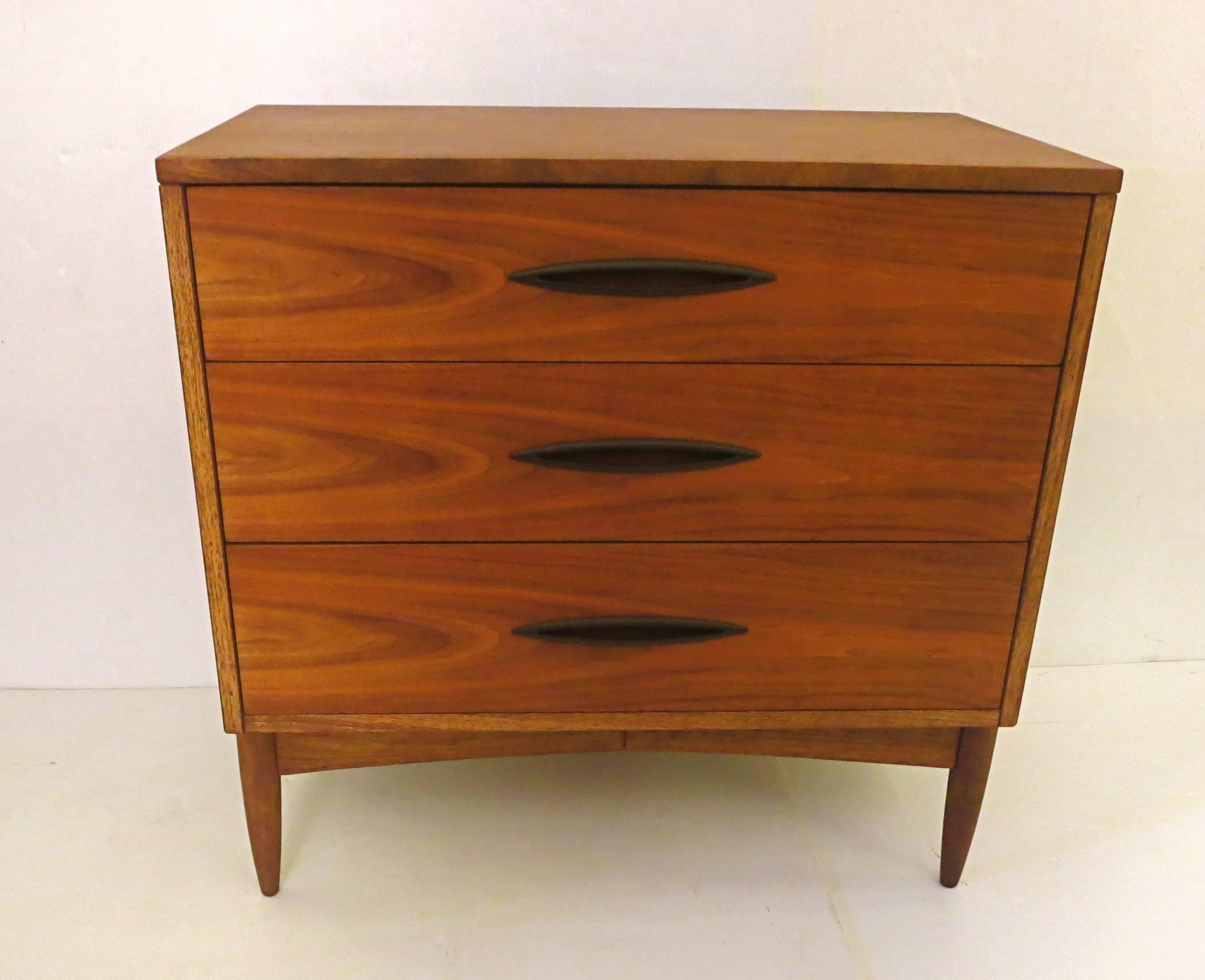 Beautiful triple dresser walnut American modern dresser chest, simple lines elegant totally refinished, with black enameled metal handles and metal railing, the drawers slide nice and soft, good quality piece.