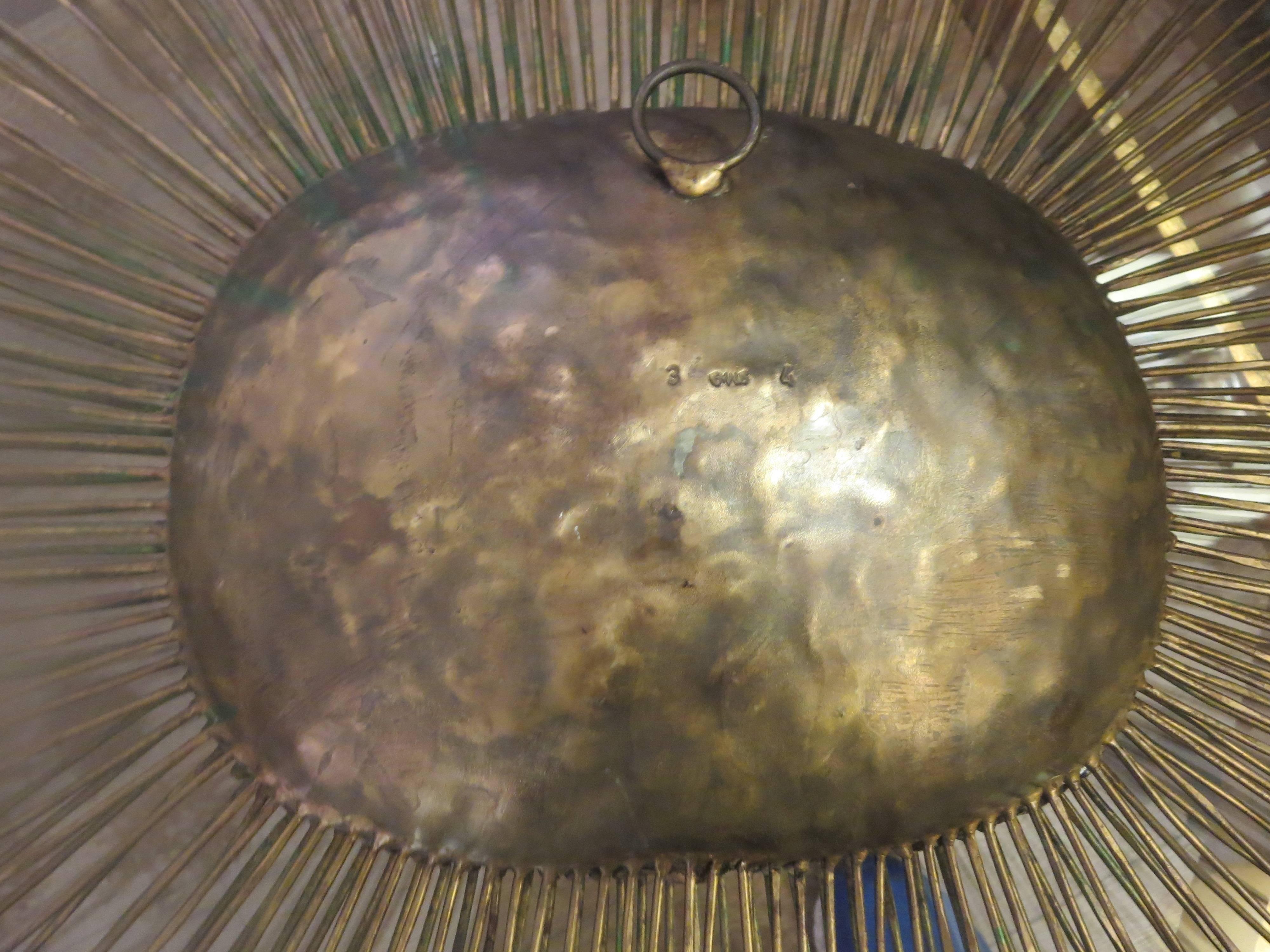 brass sun wall hanging