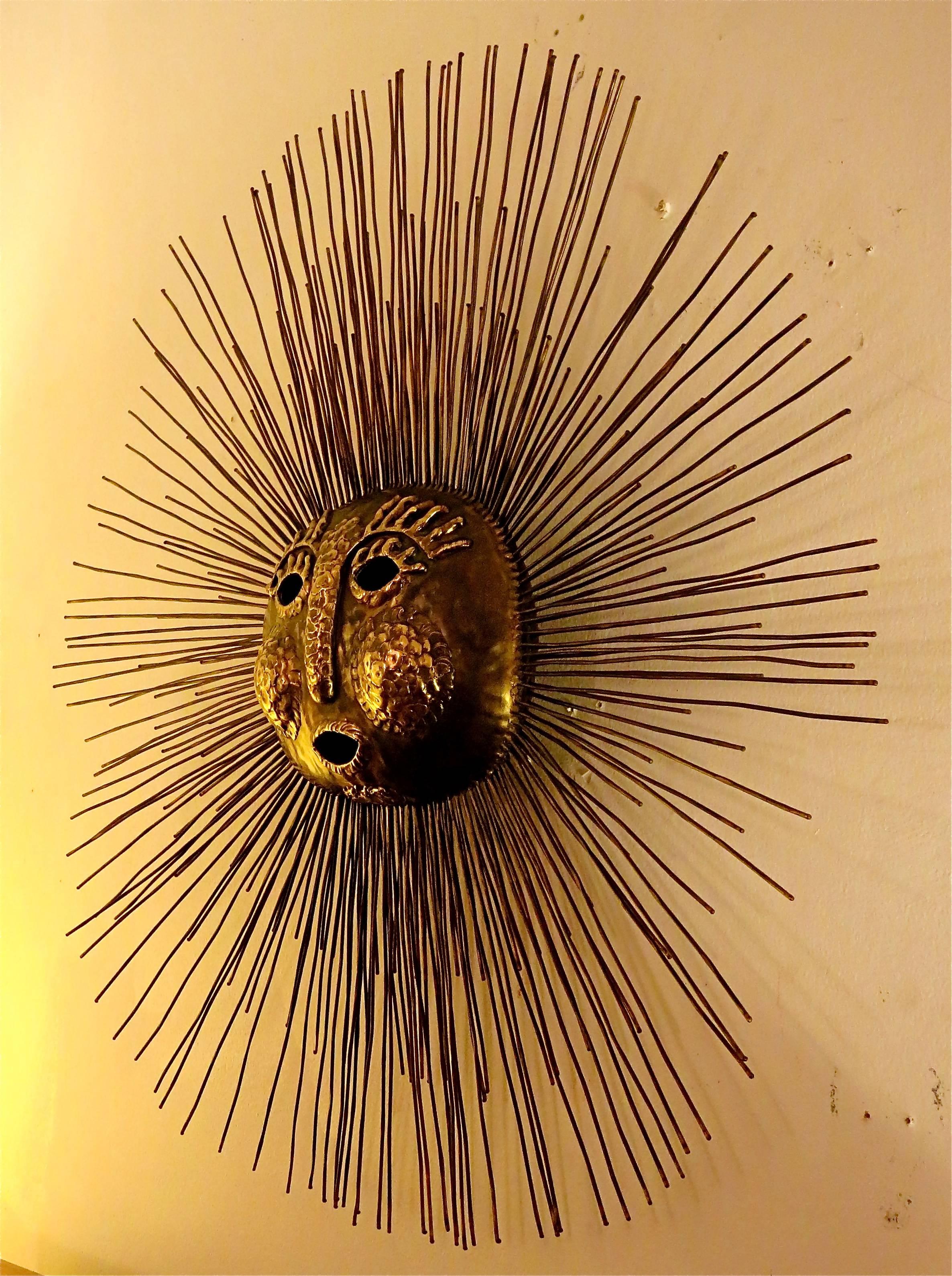 brass sun face