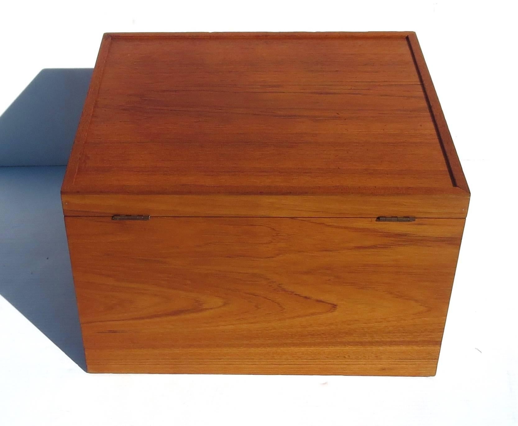 Beautiful wood on this solid teak rare file cabinet box, designed by Poul Hundevad circa 1960s, with side handles and leather strap to hold the lid when opened. Freshly refinished and in great condition.