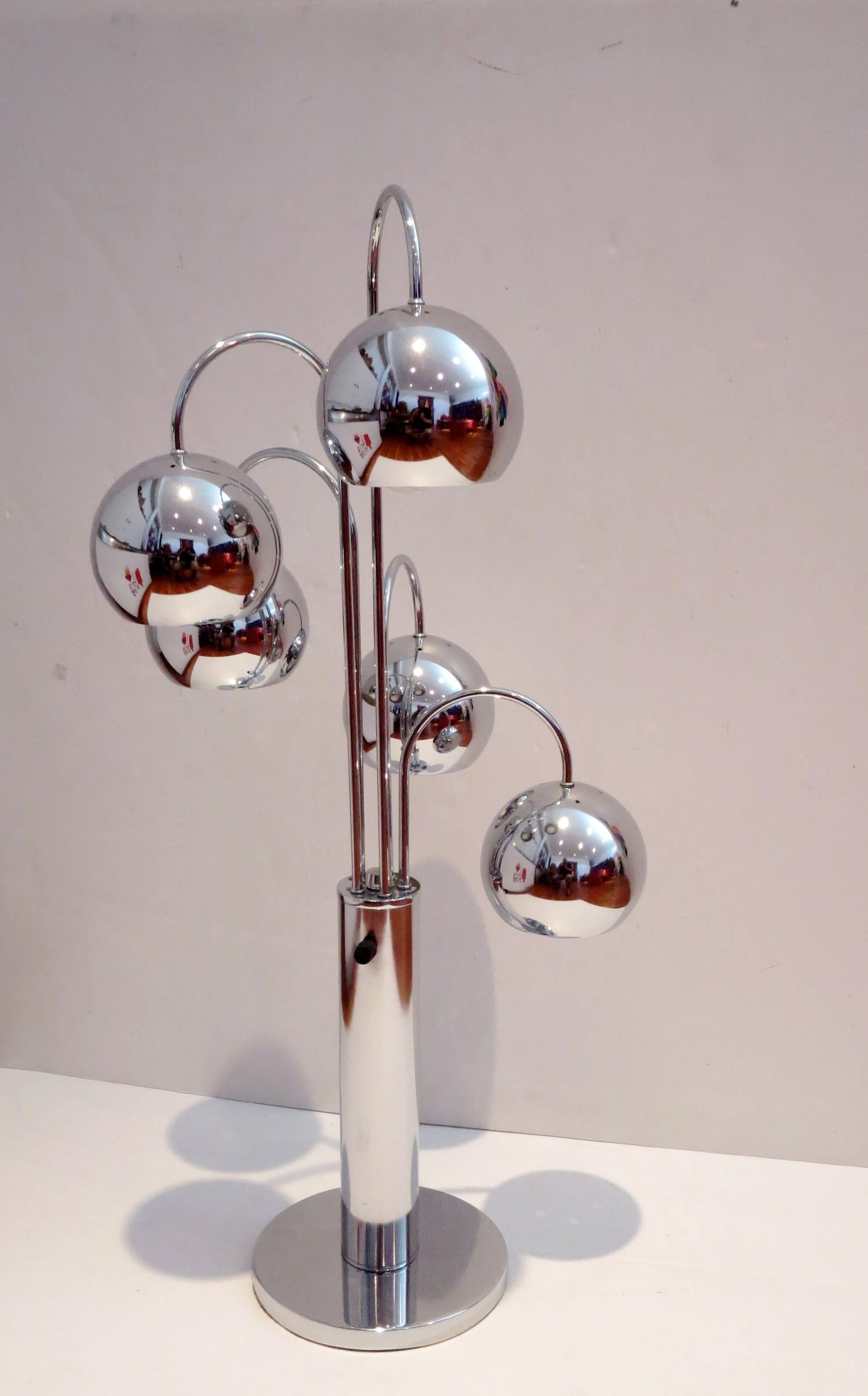 Nice and unique pair of table chrome lamp, circa 1970s, each lamp holds five chrome sphere lamp shades, with dimmer switch in very nice and clean condition chrome its been polished and shows very light wear they are beautiful and striking.