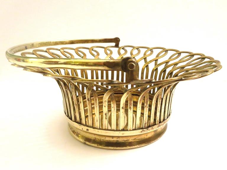 Incredible quality on this unique solid brass decorative basket, with movable handle, circa 1930s great detail and design on this unique item.