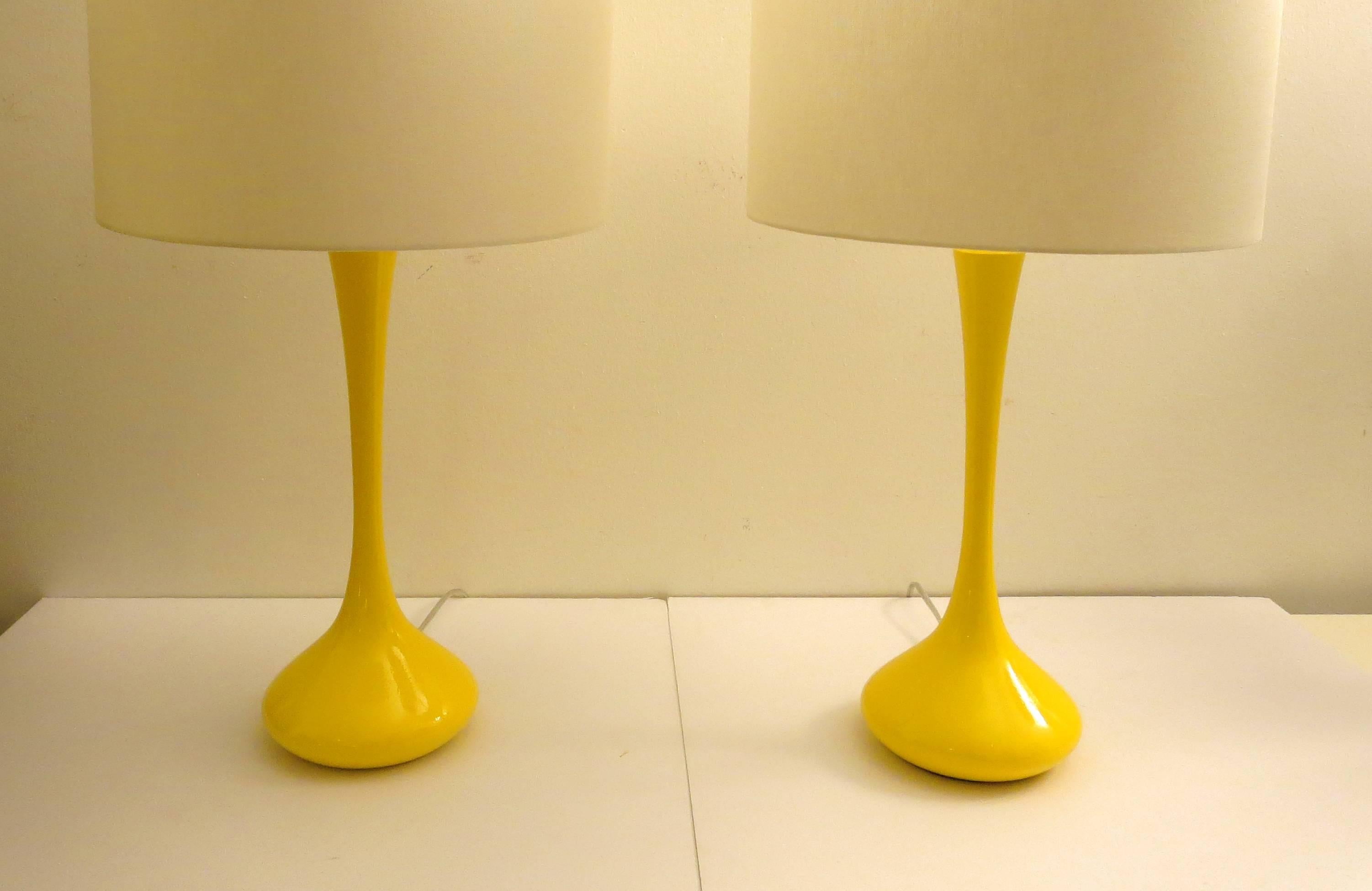 Striking set of two metal base table lamps by the Laurel lighting co, the bases have been sand blasted and powder coated in yellow, the pair has been rewired and new lamp shades been added, retains original sockets with Laurel paper label, the
