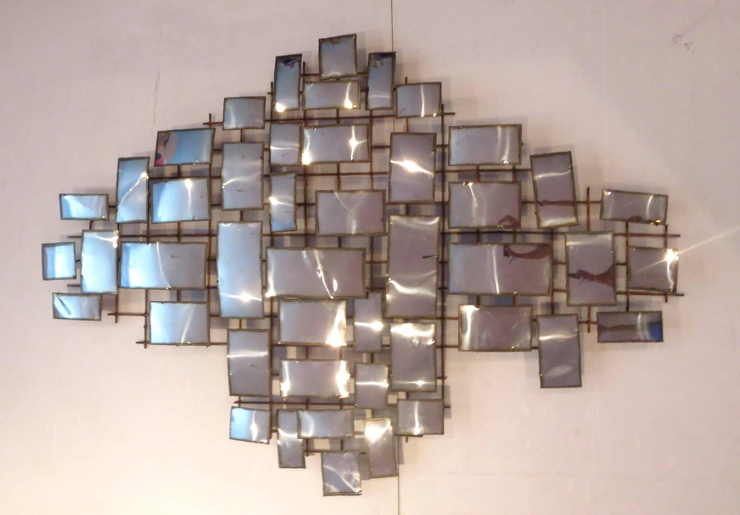 Nice large chrome squares wall sculpture by Curtis Jere, circa 1970s. Good condition with some light bending on some squares, overall very clean.