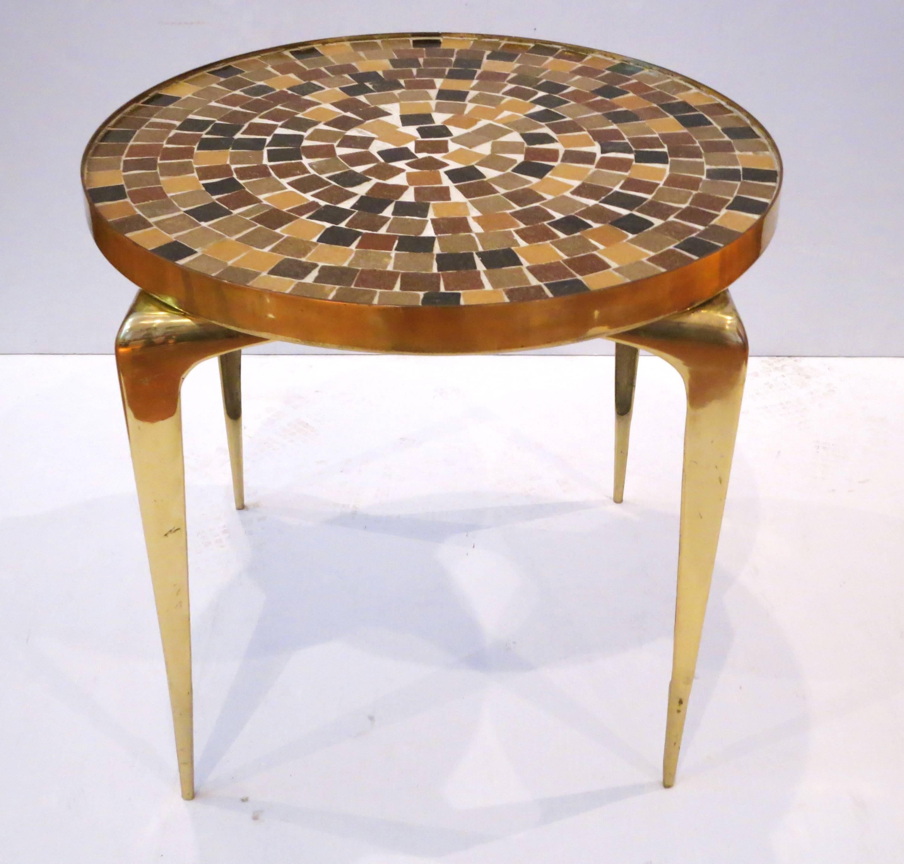 Simple elegant small round cocktail end/side table, circa 1950s solid polished brass edge ring and multicolored tile top in the style of Gio Ponti, beautiful solid brass sculpted legs solid and sturdy.