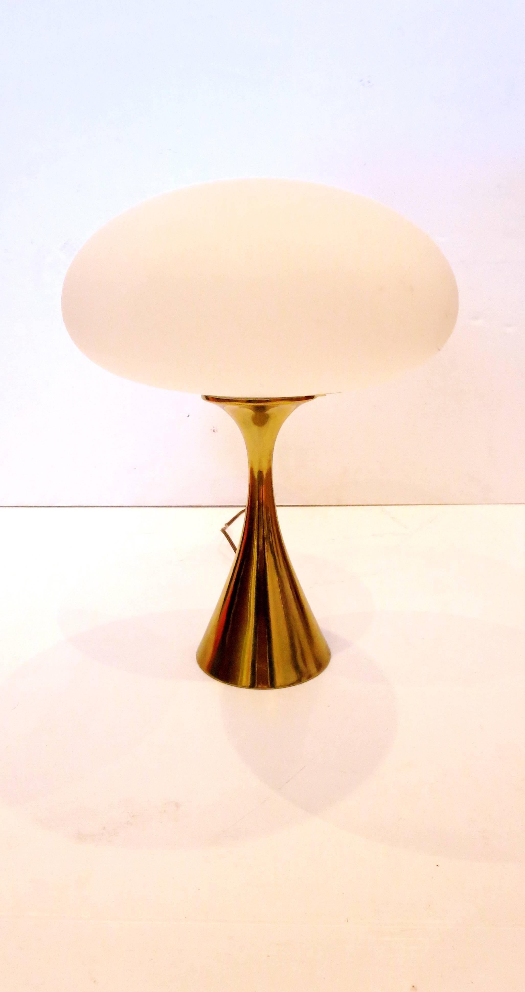 Nice elegant and hard to find pair of mushroom lamps by Laurel lighting, Italian mouth blown glass original shades, with polished brass bases great condition, hard to find a matching pair like these.