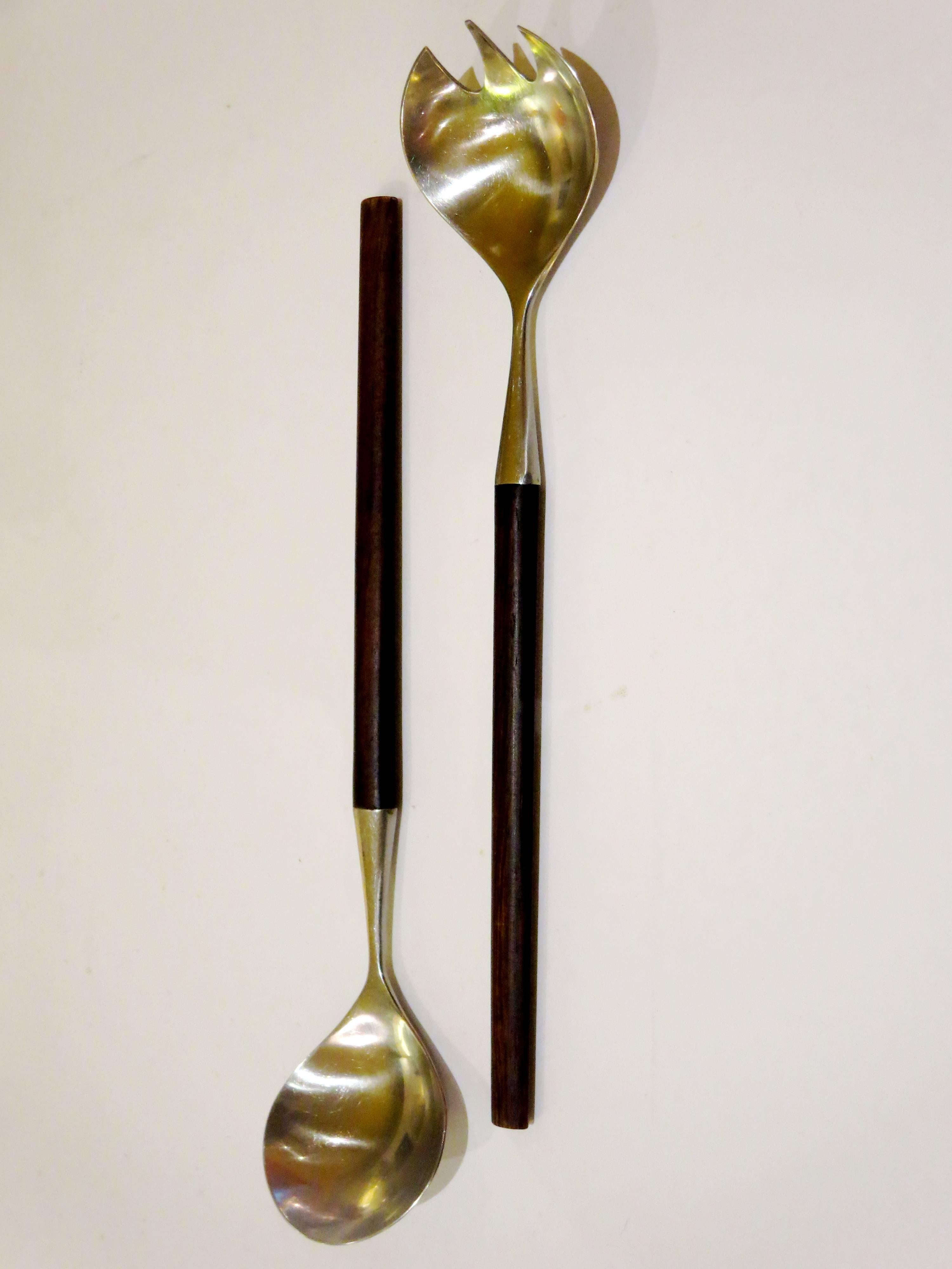 Simple elegant set of salad servers set made in Norway by Lauffer, palisander handles and stainless steel, nice original condition very collectible flatware.