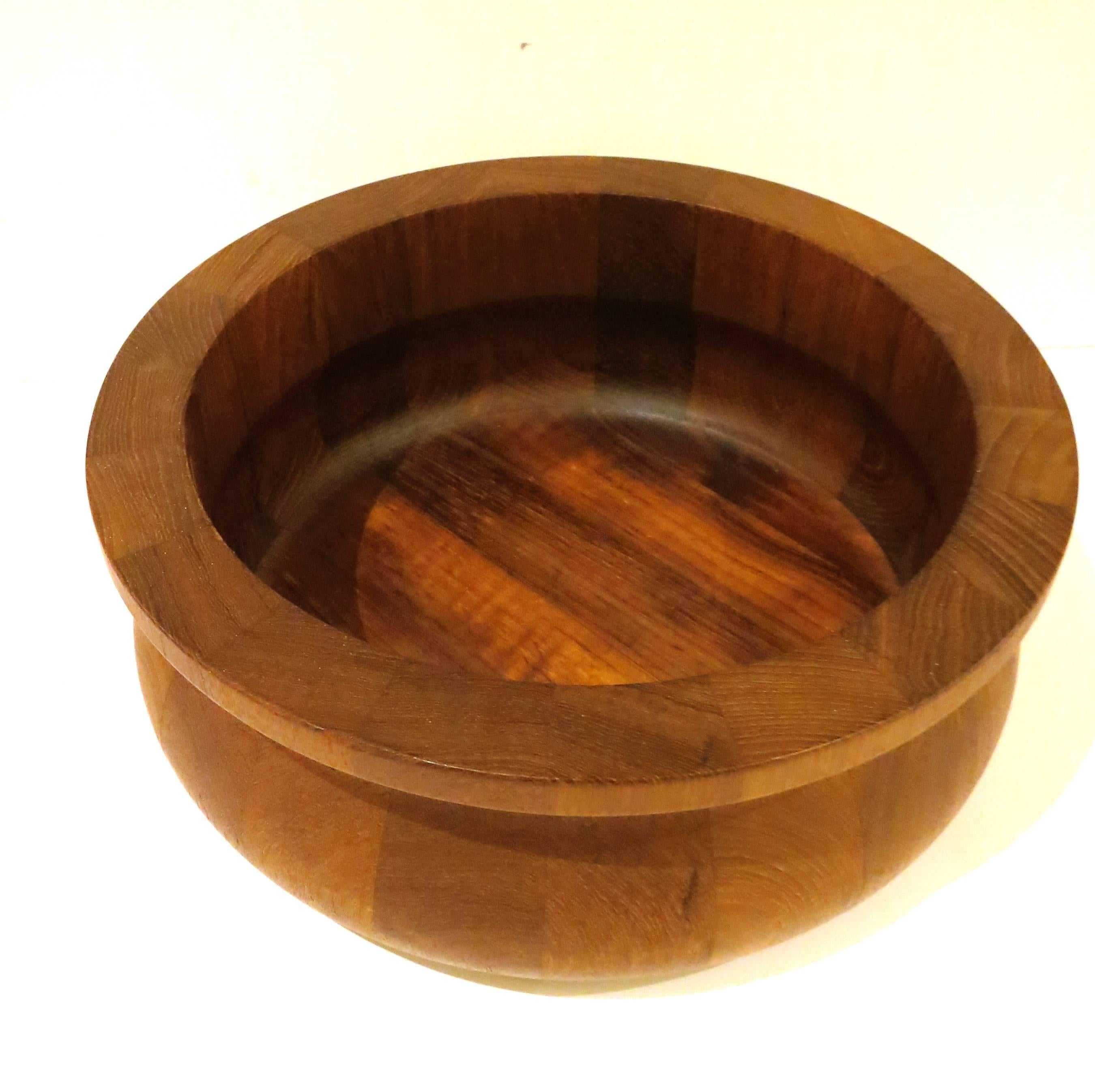 Rare shape on this solid teak, salad bowl designed by Quistgaard for Dansk, circa 1950s. Great condition early production.