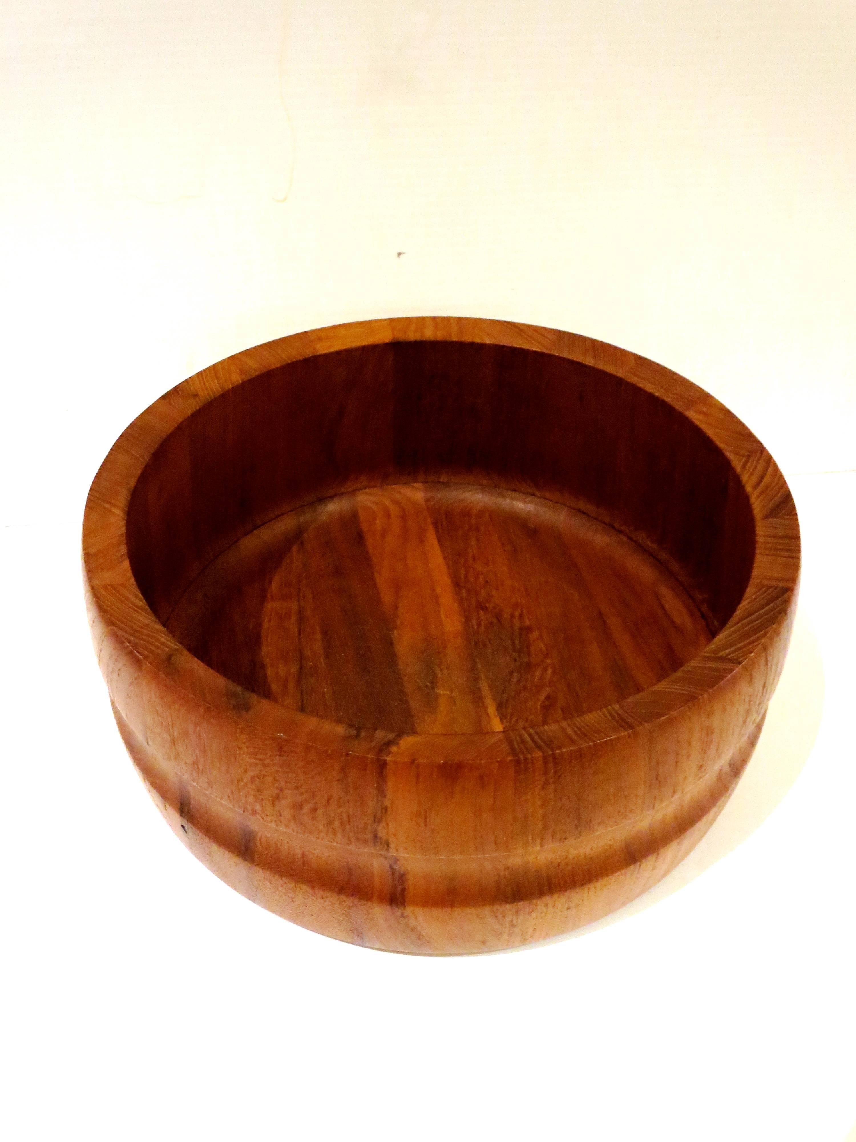 Rare shape on this solid teak, salad bowl designed by Quistgaard for Dansk, circa 1950s great condition early production.