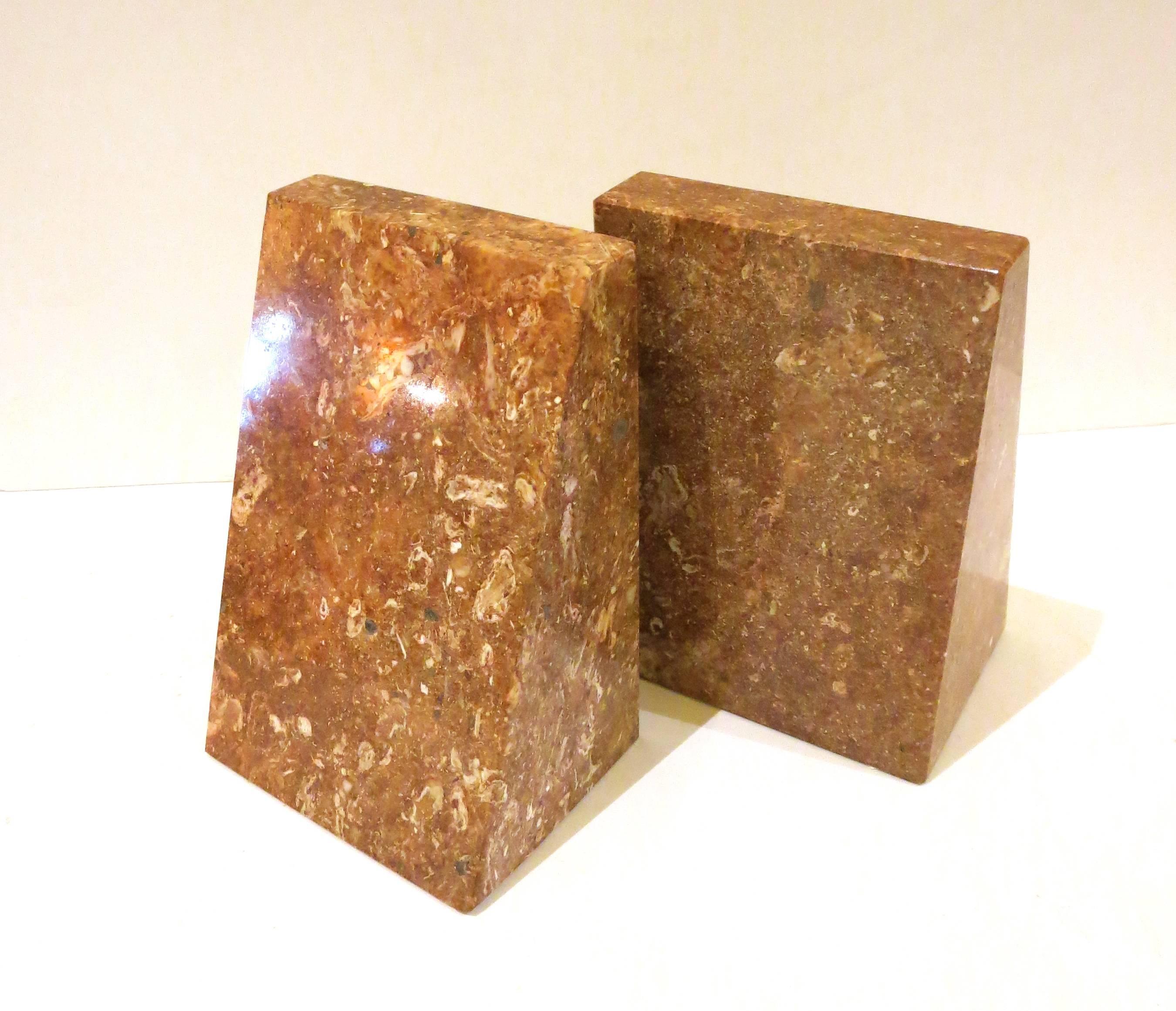 Nice design on these pair of solid marble, bookend circa 1980s great condition no chips or cracks.