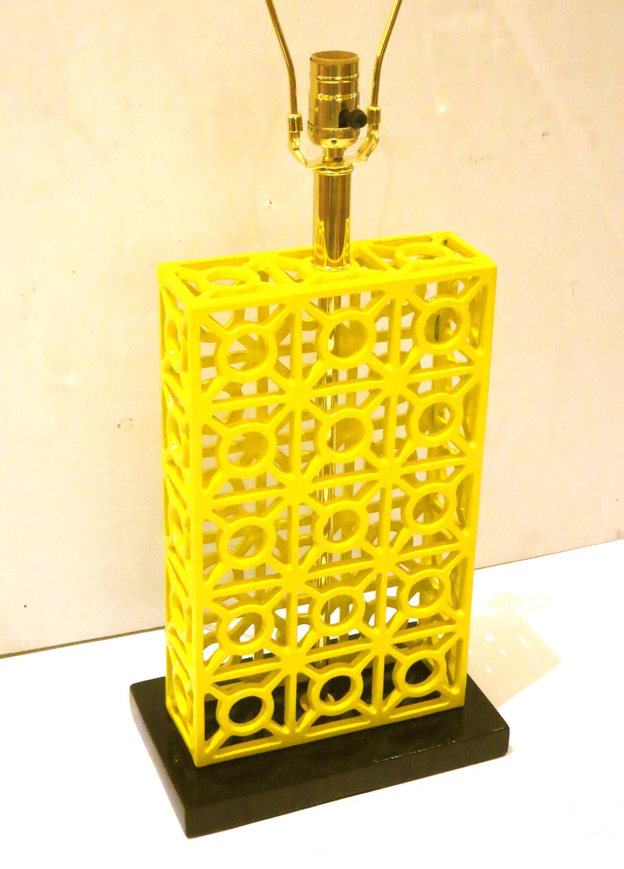 Beautiful unique cage style iron table lamp, circa 1970s very heavy one of a kind custom-made lamp, the frame its solid steel sand blasted and freshly powder coated in vibrant yellow, sitting on a black lacquered gloss base, freshly rewired and