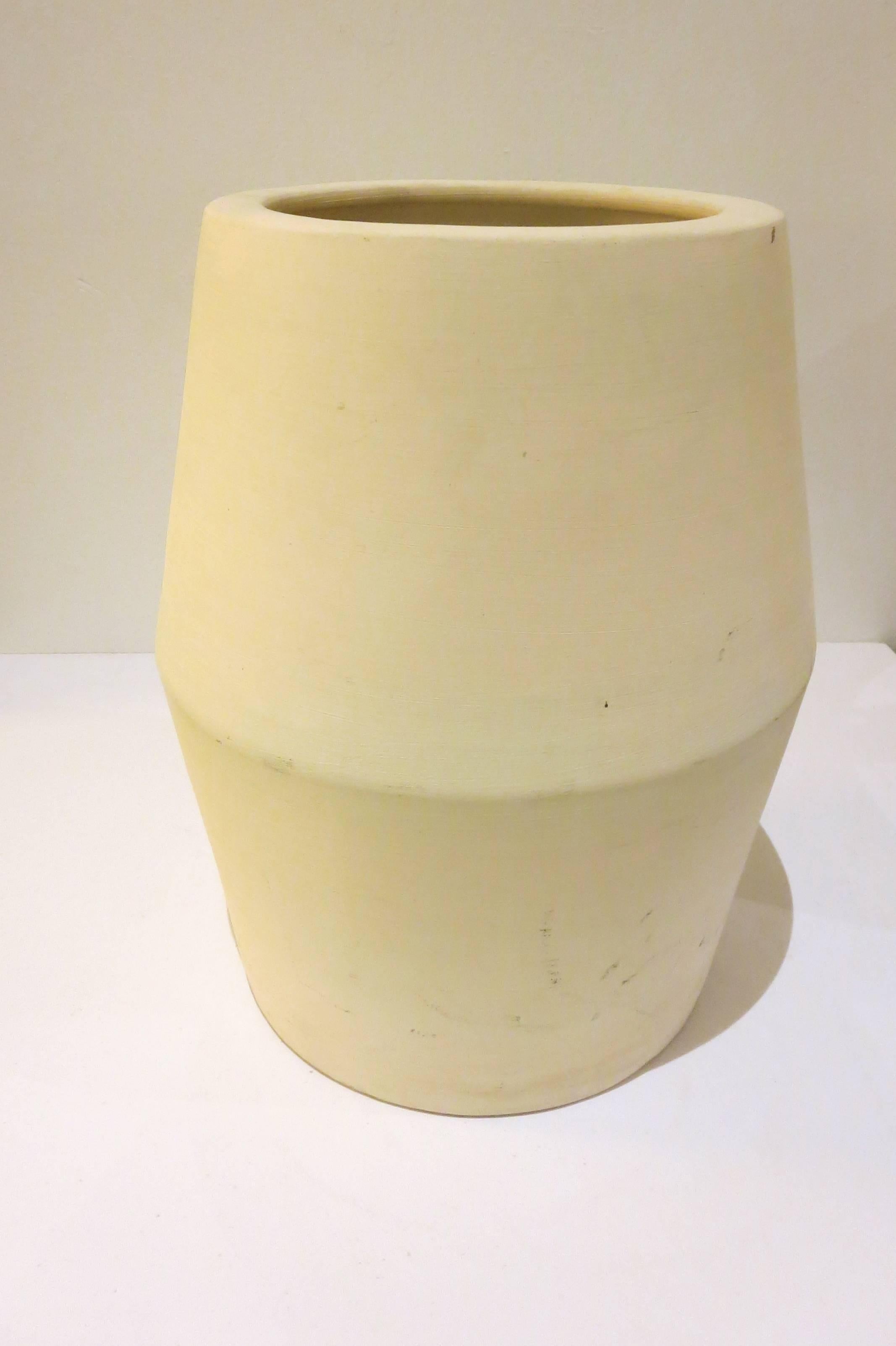 Nice and rare shape on this planter designed by Legardo Tackett for Architectural Pottery, circa 1960s. In Bisque finish perforated at the bottom for drain. Unmarked early production, very nice and clean condition no chips or cracks.