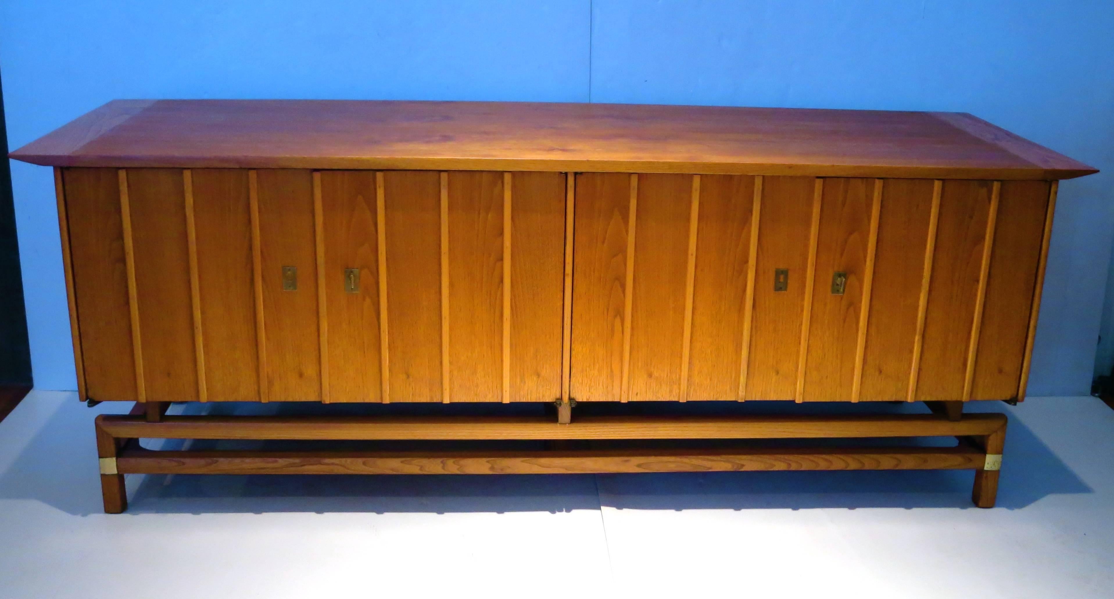 Mid-Century Modern Striking 1950s, American, Mid-Century Large and Low Credenza With Brass Accents