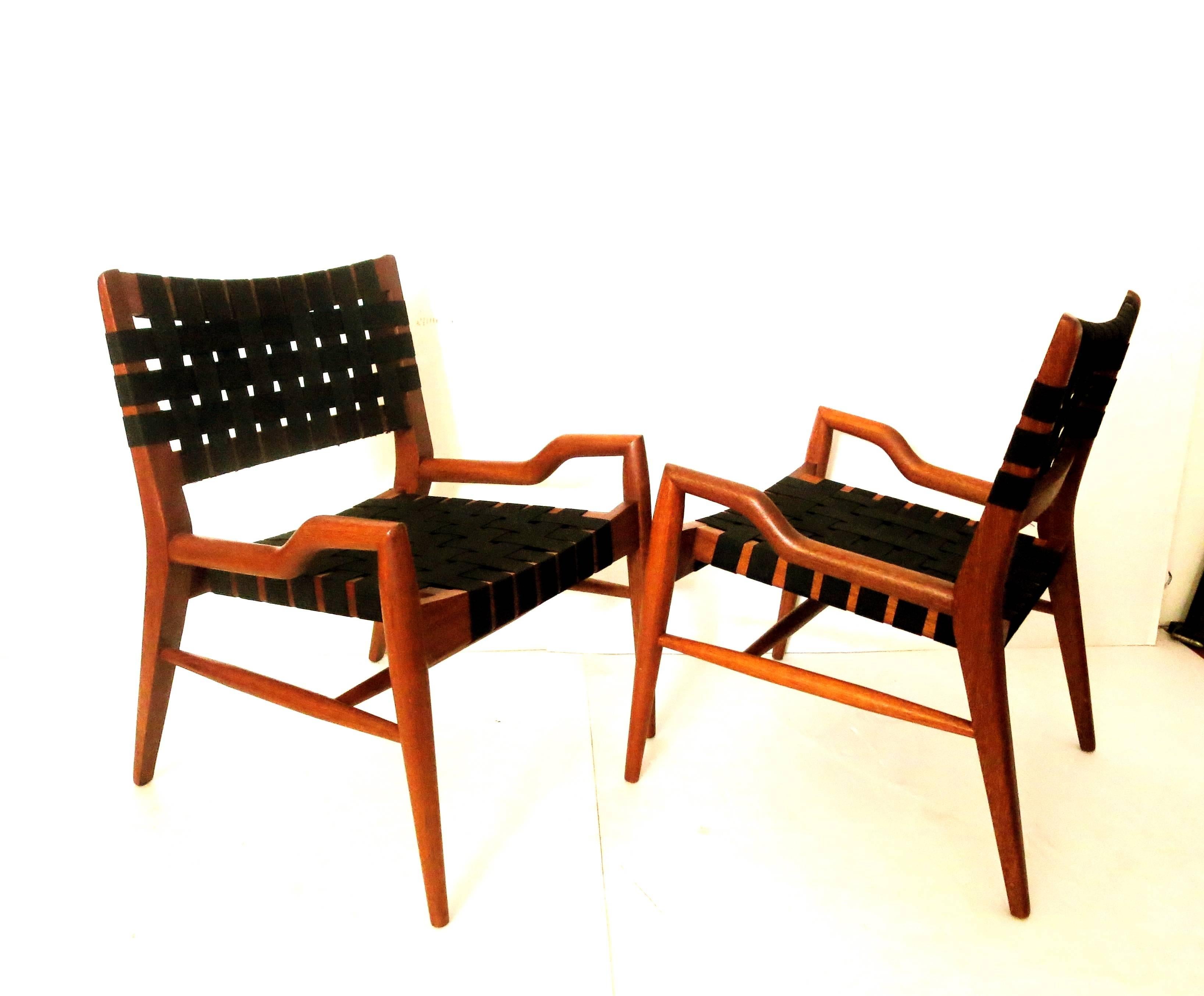 A rare pair of small club chairs, designed by John Keal for Brown Saltman, circa 1950s solid mahogany sculpted frames, with black nylon straps woven, solid and sturdy with an incredible look. The frame has been sanded and restored and new straps put
