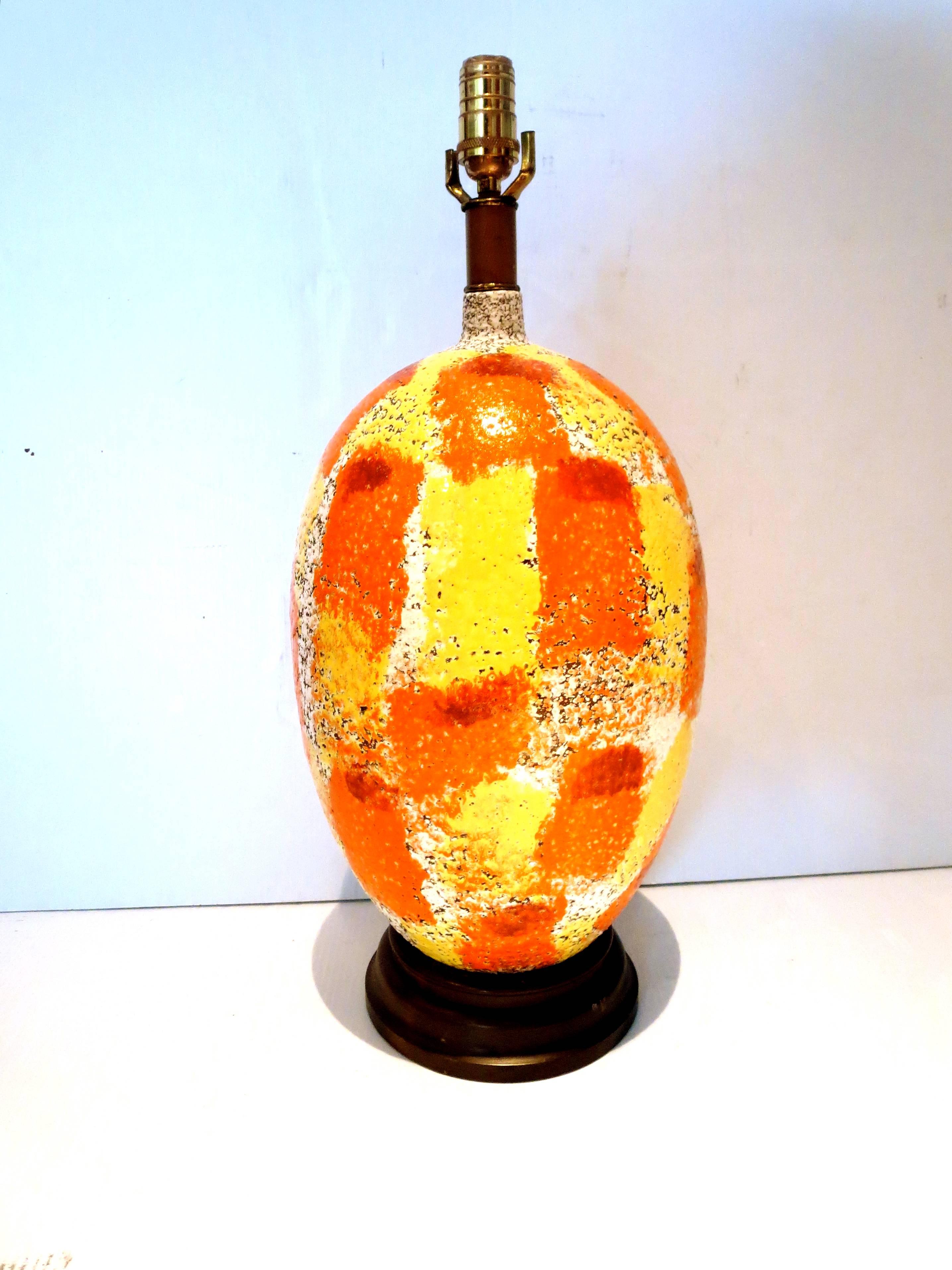 Gorgeous large ceramic lamp in beautiful colors, orange and yellows lava glaze ceramic style, no chips or cracks in perfect working condition, no lampshade included. The lamp its 25