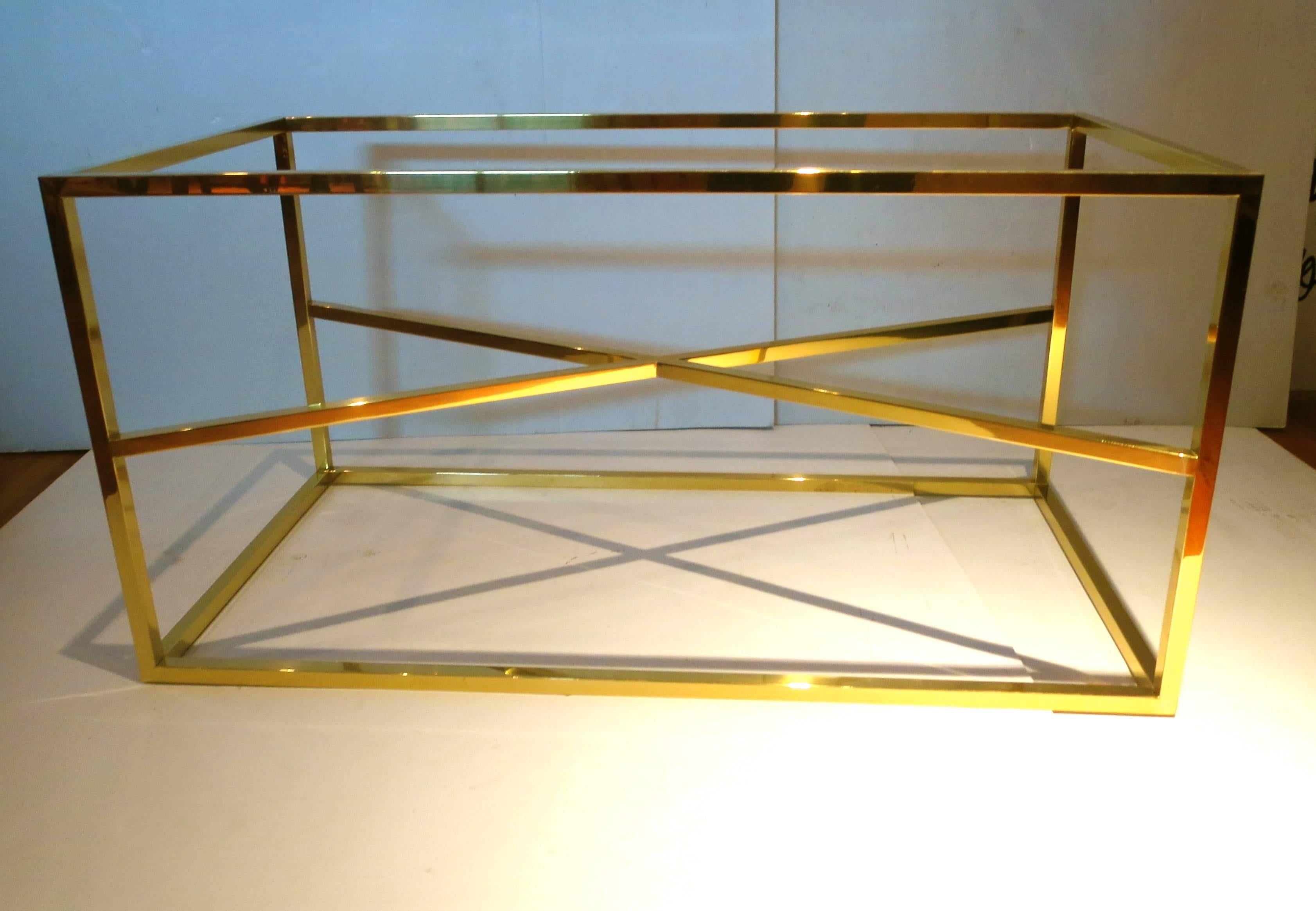 Beautiful X base coffee table base, made of solid brass square piping, great quality polished finish, invisible welding, solid and sturdy, can take a glass or marble top if desired, circa 1970s.