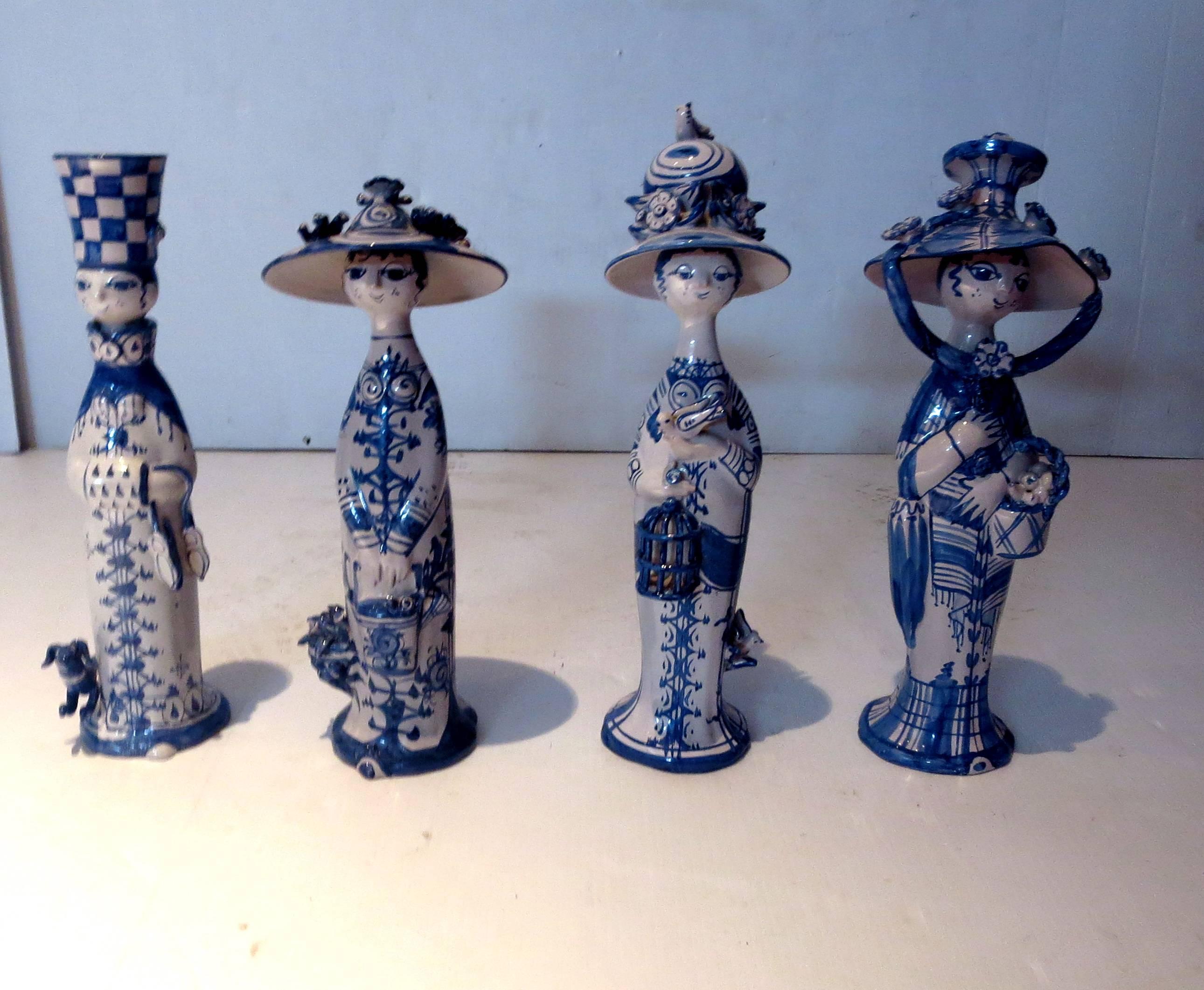 Beautiful and rare complete set of ceramic figurines by Bjorn Wiinblad, in porcelain winter, summer, fall and autumn, nice condition no chips or cracks, signed at the bottom of each piece.