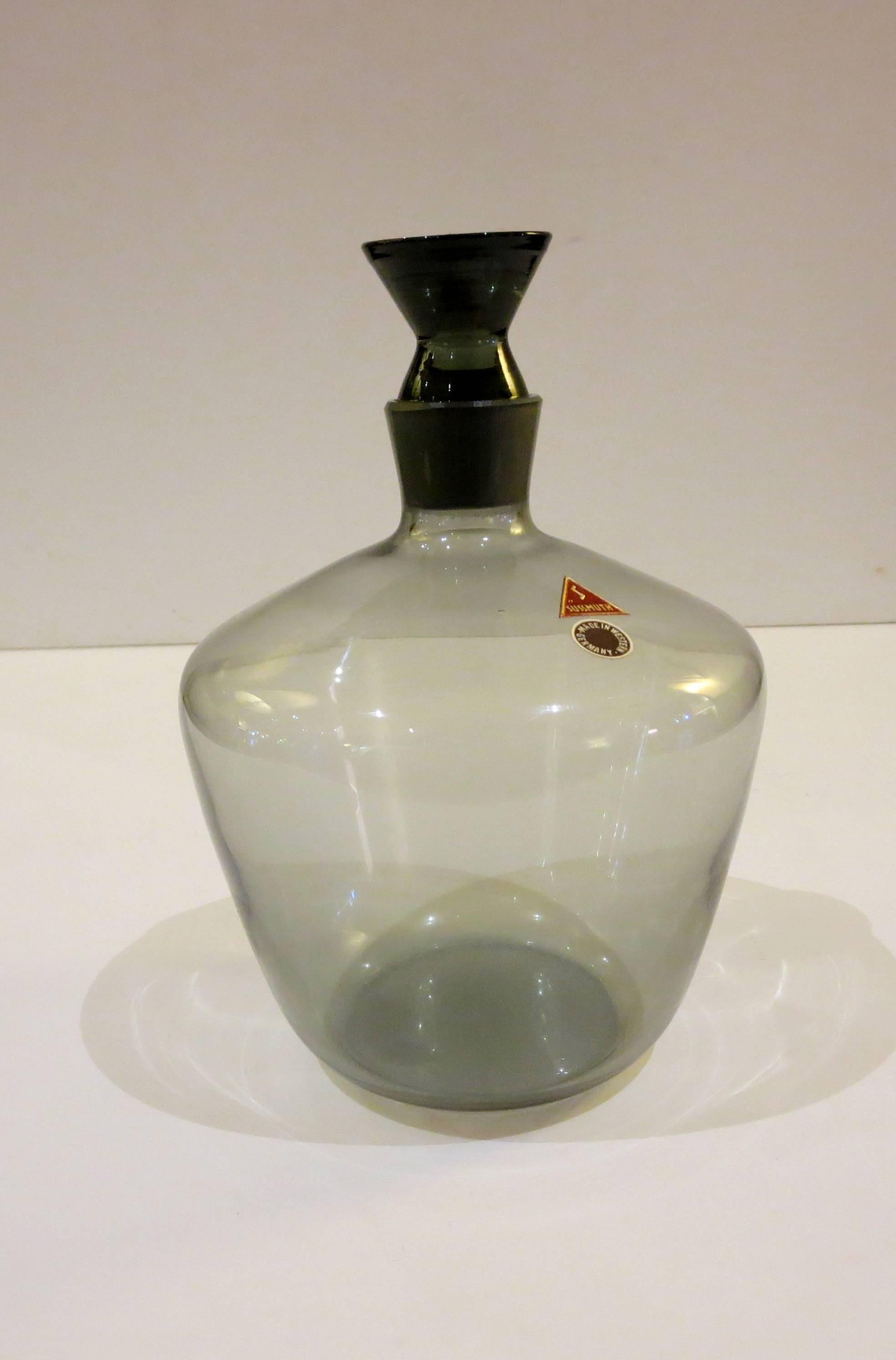 Beautiful elegant small smoke crystal decanter, with stopper brand new never used made in the 1950s.