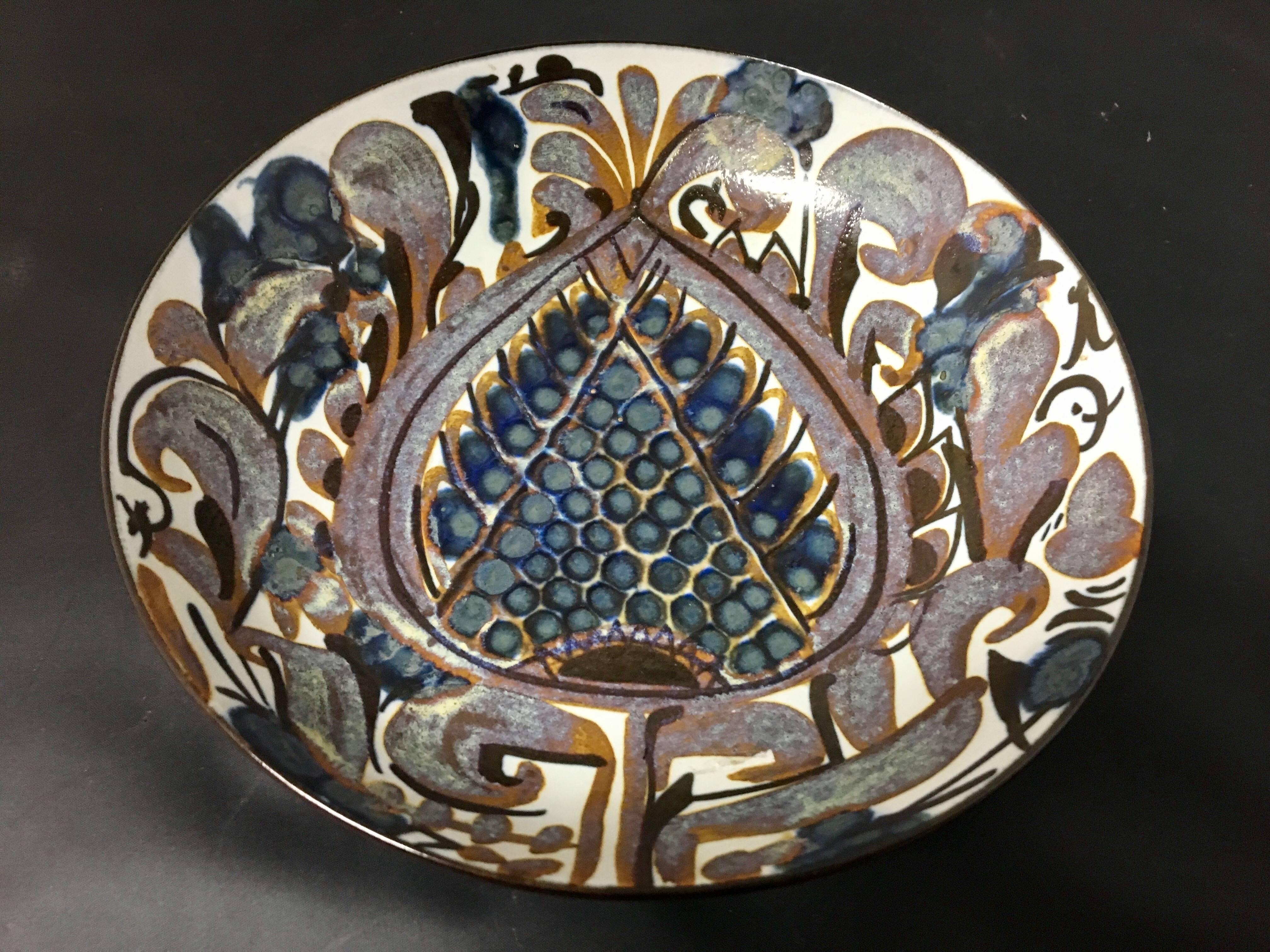 Elegant pattern on this bowl designed by Kari Christiansen for Royal Copenhagen. The piece is signed and numbered and in excellent condition with no chips cracks or scratches.