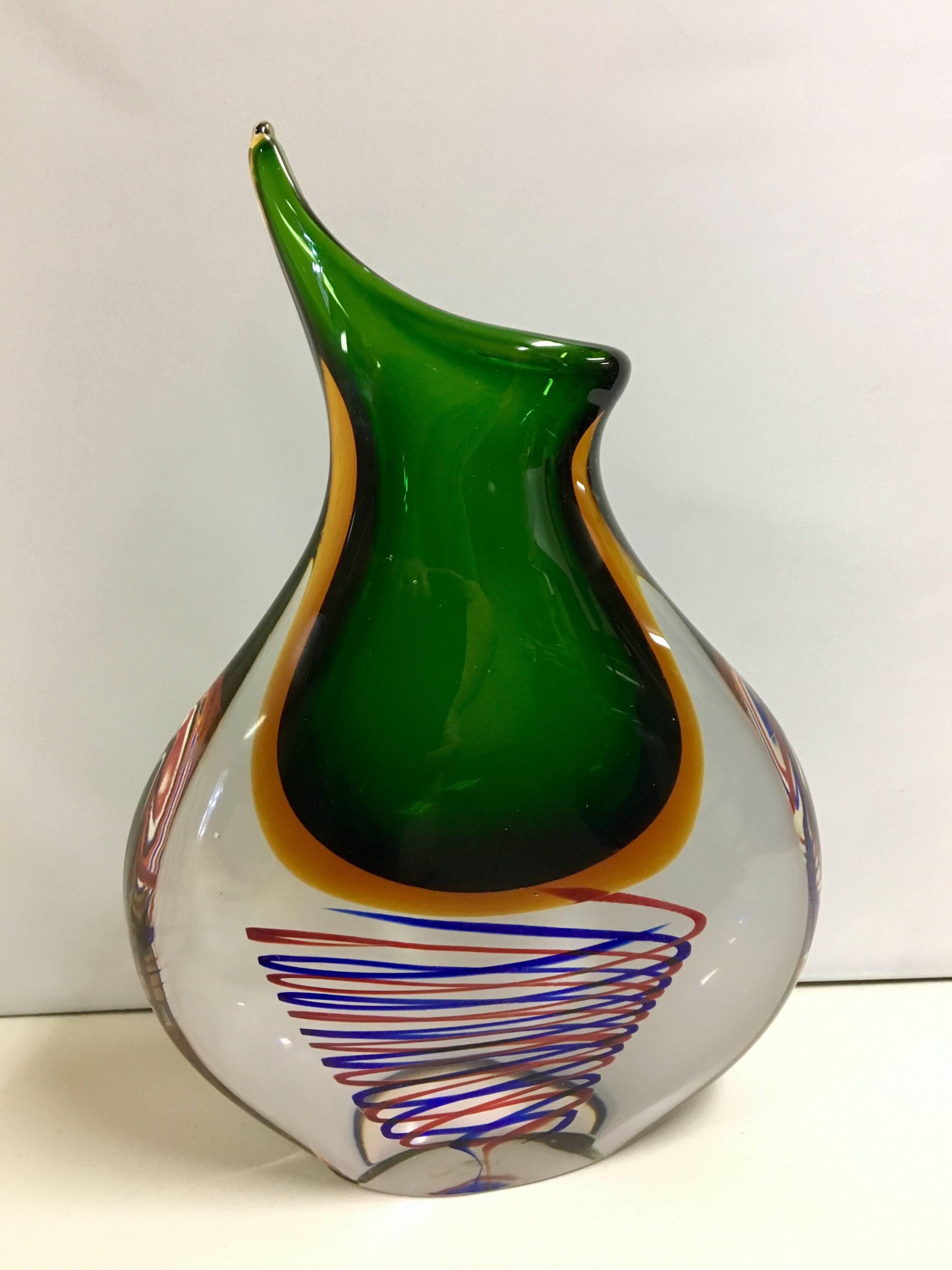 Beautiful and rare vase by Flavio Poli for Seguso, Murano, Sommerso organic glass vase. Vibrant colors on this incredible piece with a twisted swirl accent, at the bottom in red and blue, with a green, yellow and clear combo. No chips or cracks