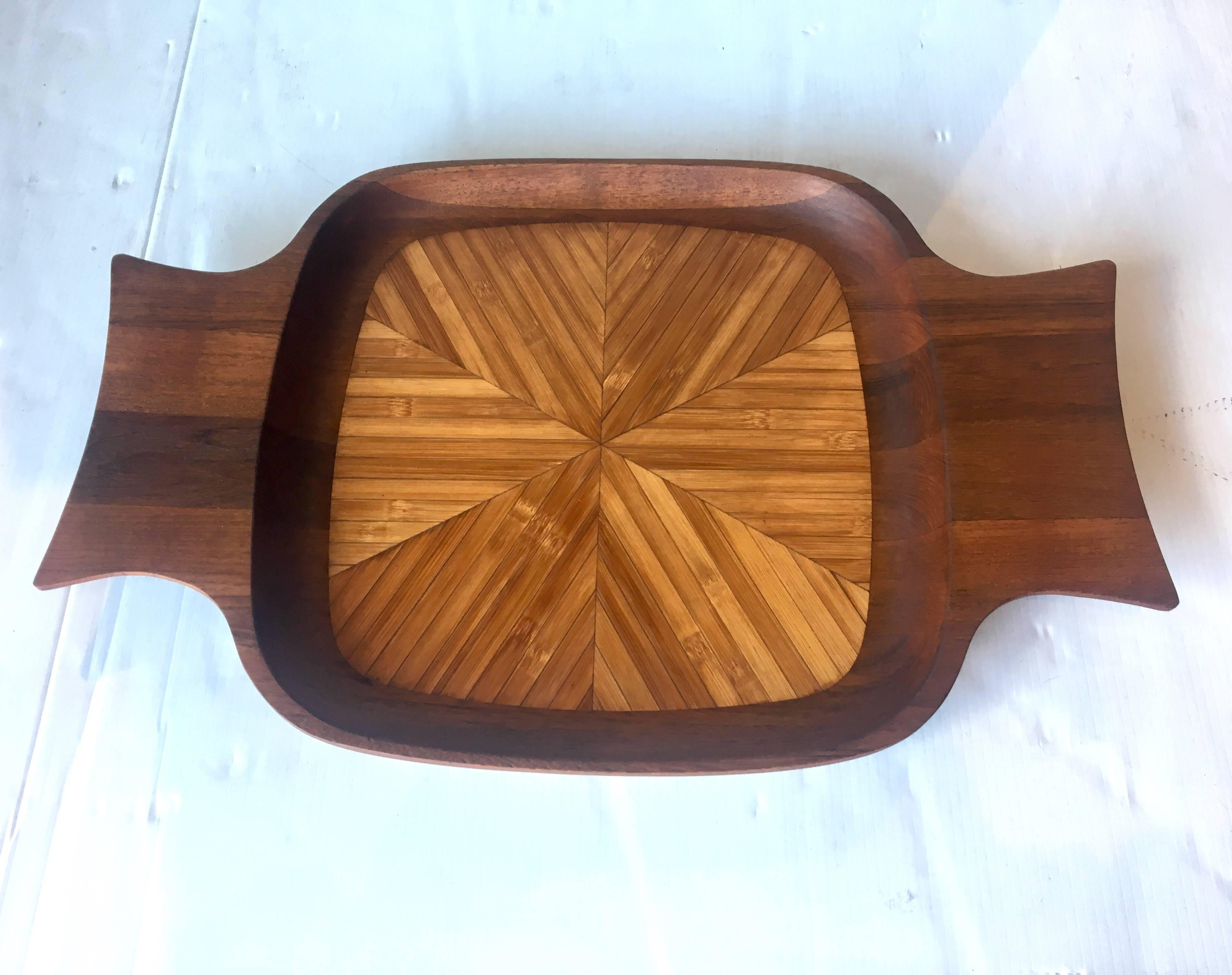 Beautiful and rare solid teak and bamboo tray designed by Quistgaard for Dansk early production with Ducks stamped logo. Freshly refinished.
