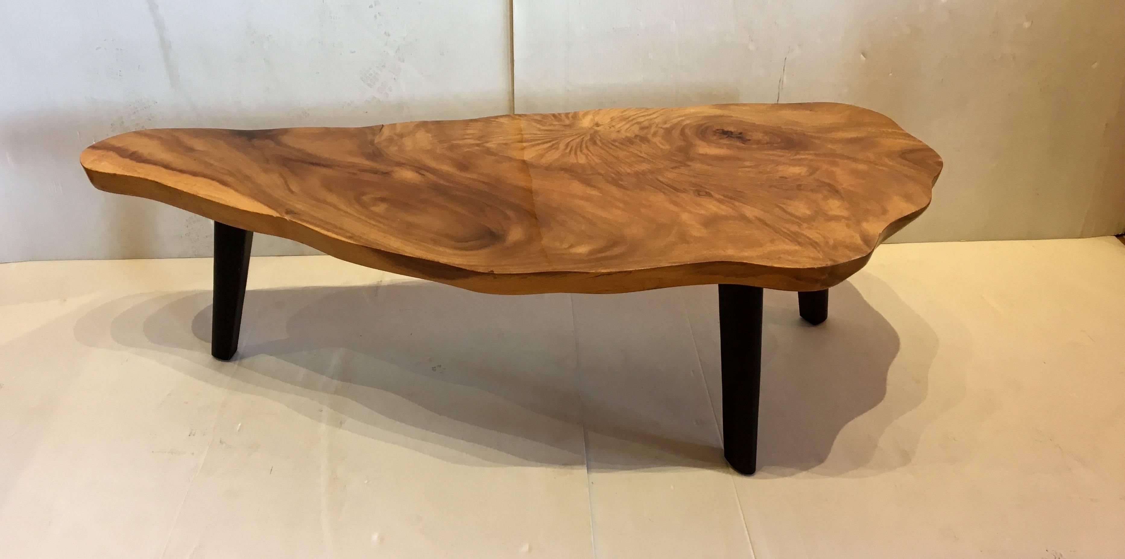 Beautiful three-legged solid Thick Koa wood, free-form coffee table, high gloss clear lacquer solid top. Sitting on three solid black lacquer legs, nice grain and unique shape very nice and clean condition.