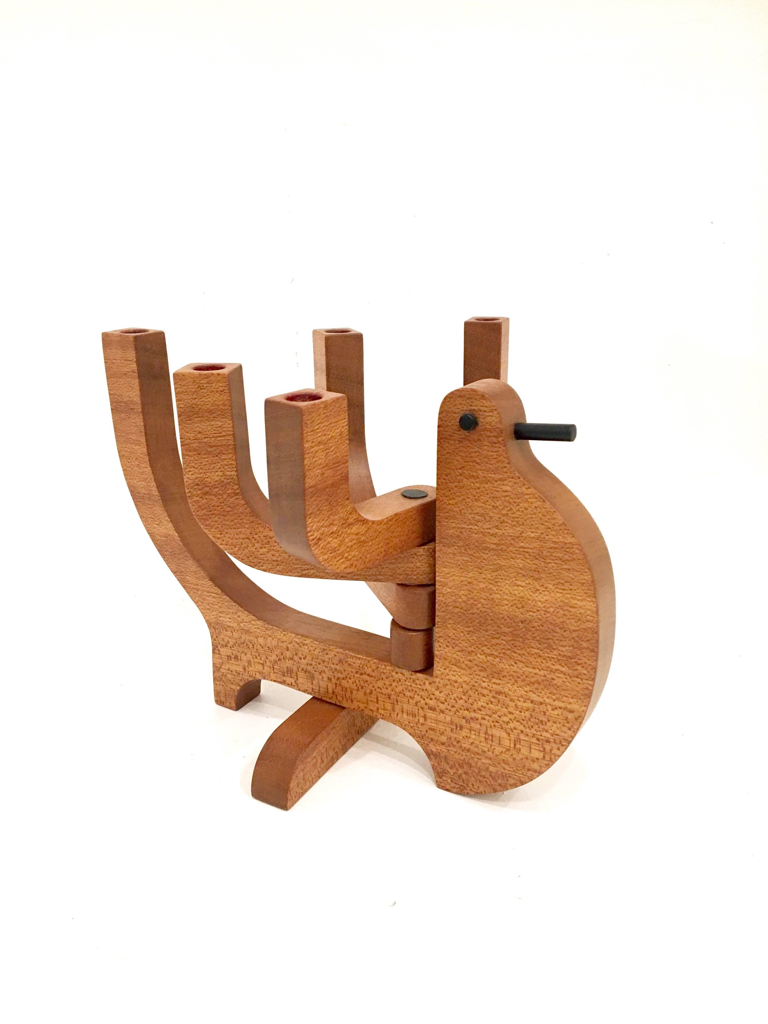 Whimsical versatile multiposition candleholder, solid teak five candle capacity 1/2" diameter candles well done piece.