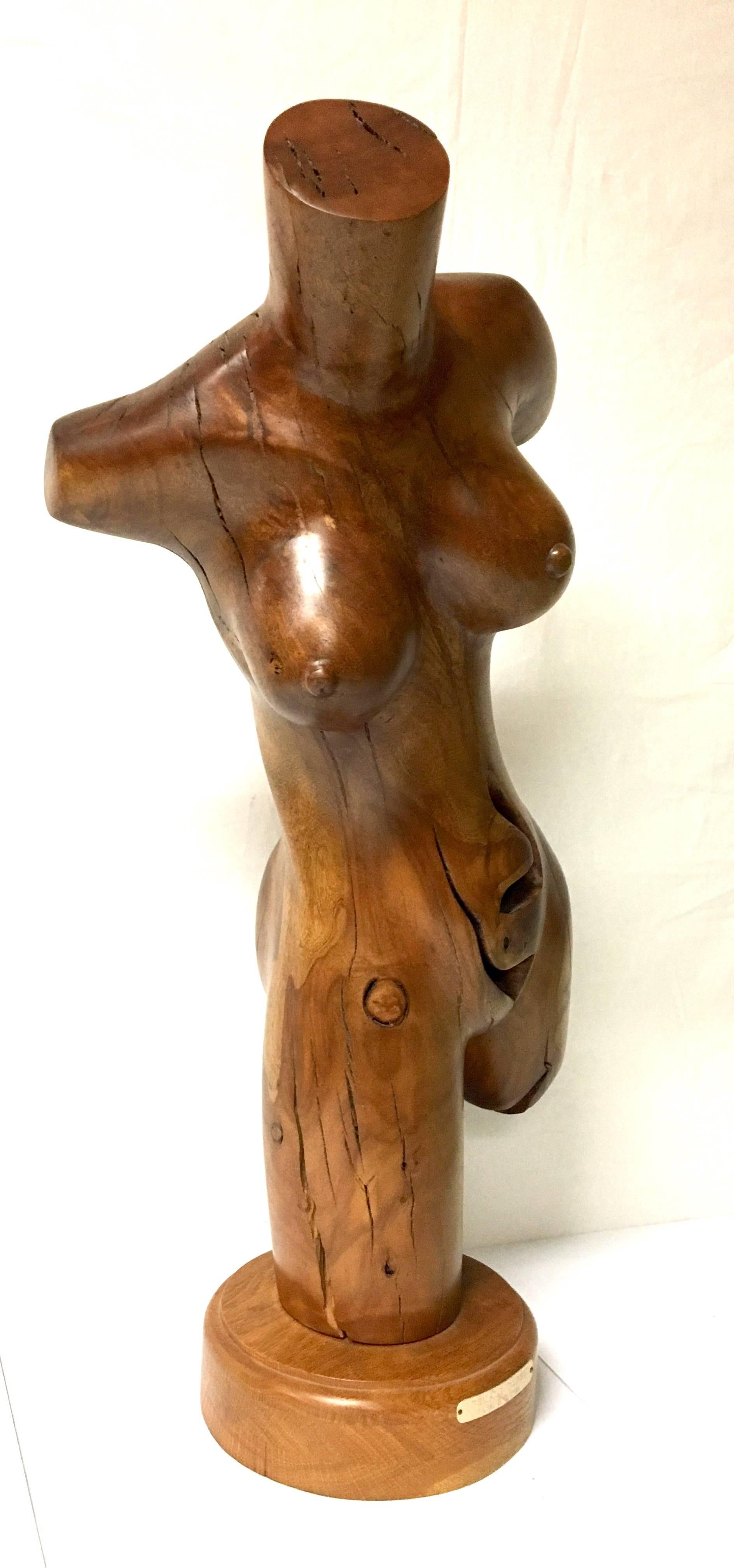Well done hand-carved female torso by Jose Z Sabroso, California artist in solid hard wood. The stunning piece is 26