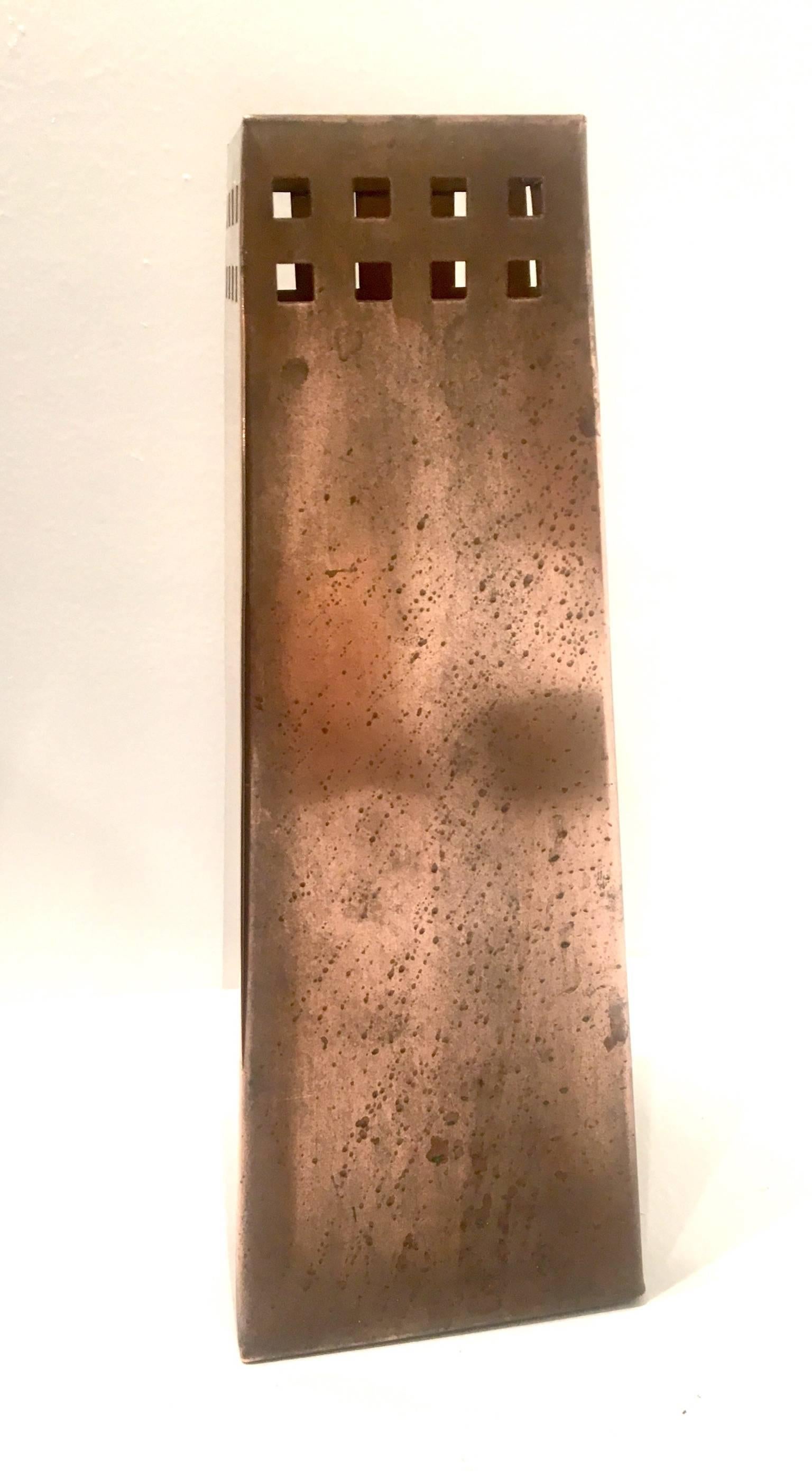 Rare solid perforated patinated copper vase, circa 1991 in the style of Roycroft Trapezoide vase made in Berkley and signed at the bottom by Verdigris copper works Berkley 1991.