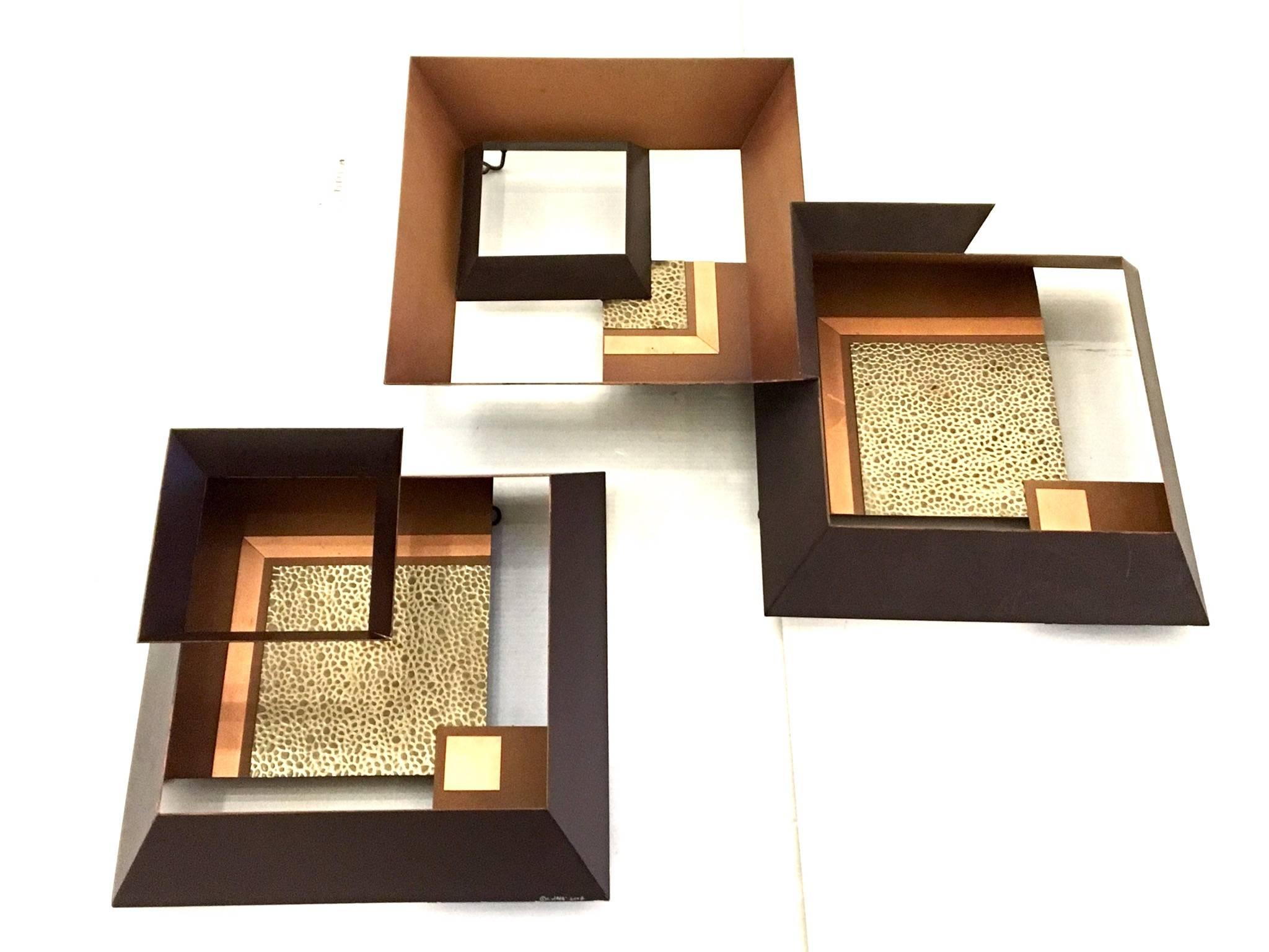 Striking multi position geometric wall sculpture by Curtis Jere, painted metal in brown , copper and gold finish , each square measures 14
