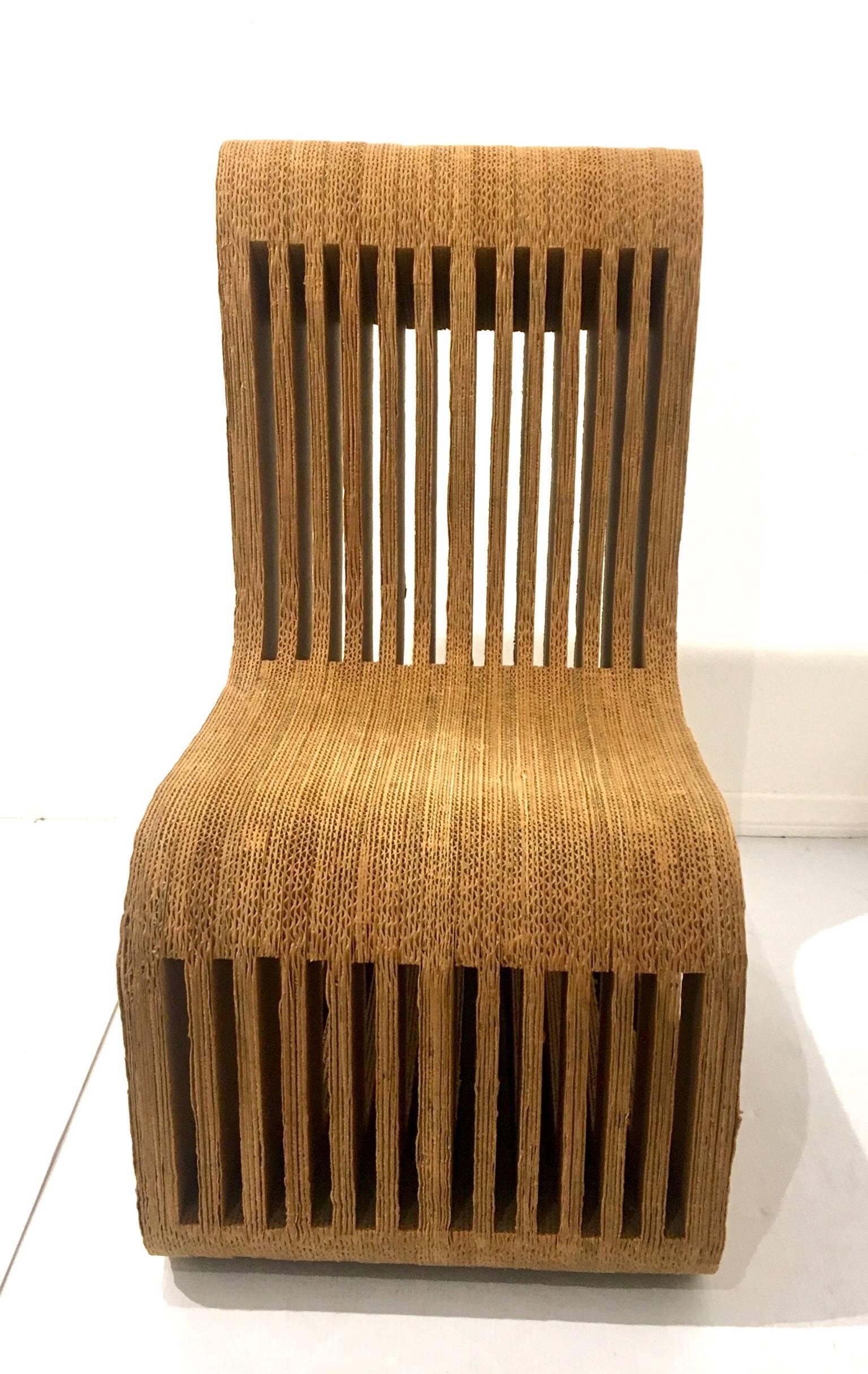 A very rare chair, in cardboard, circa 1980s according to the owner she purchased this chair in the early 1980s, and was sold to her as a prototype chair by arq. Frank Ghery, the condition its very clean with some light stains, but overall very