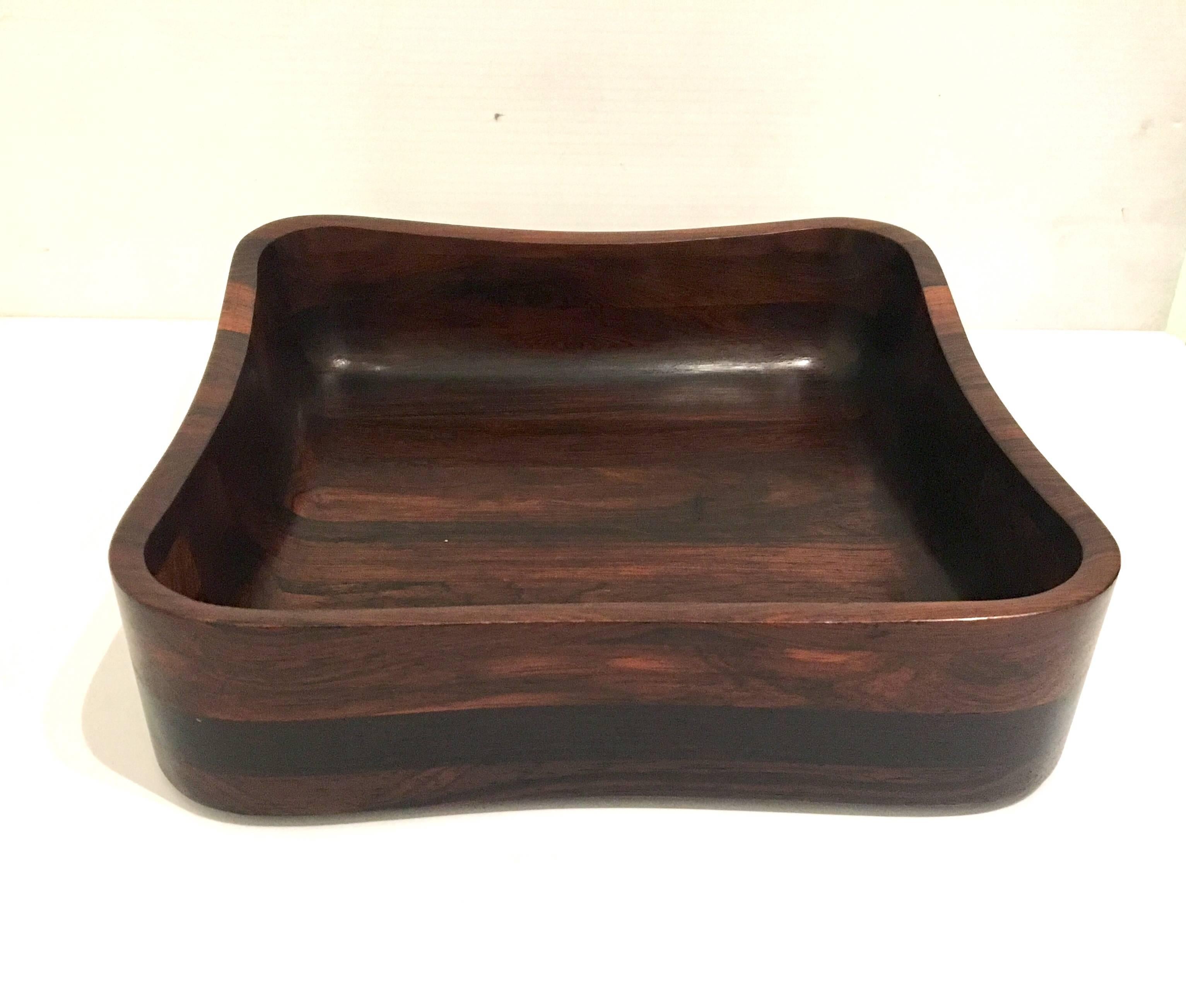 Beautiful and rare set of five pieces a salad bowl and four small bowls, solid rosewood sculpted wood Made in Denmark, circa 1950s, each small bowl its 6