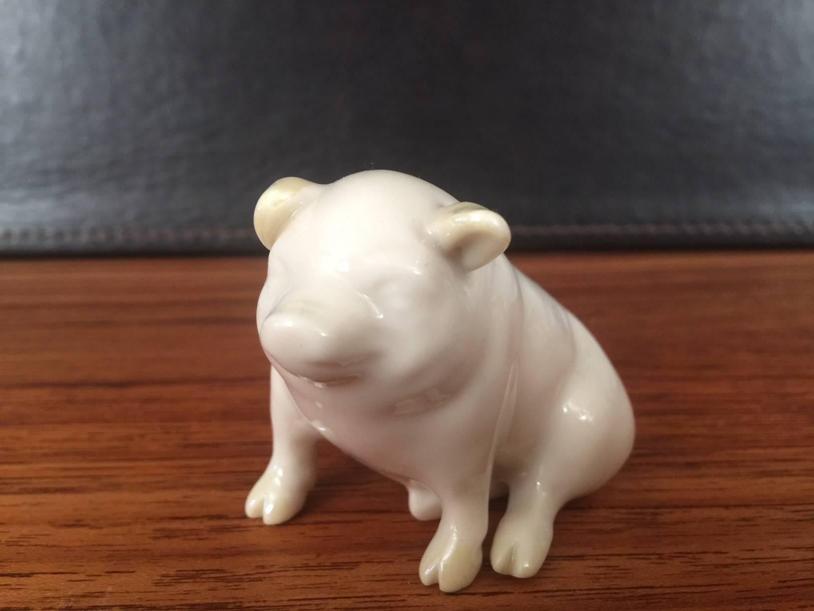 Whimsical porcelain pig made by the Belleek Pottery Ltd. of Ireland, circa 1980s.