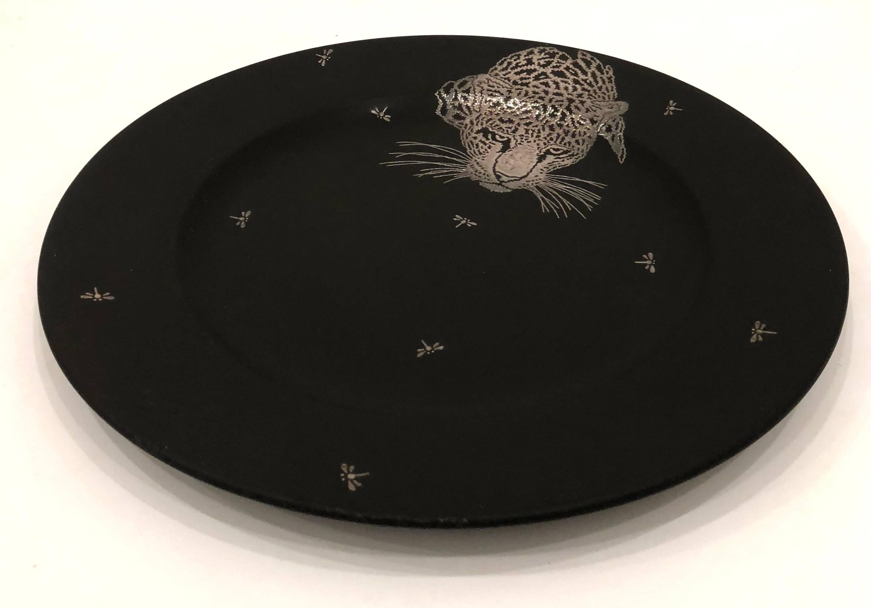 Beautiful decorative black mate ceramic plate, by Emilia Castillo, with silver decoration leopard and dragonflies. Great condition no chips or cracks.