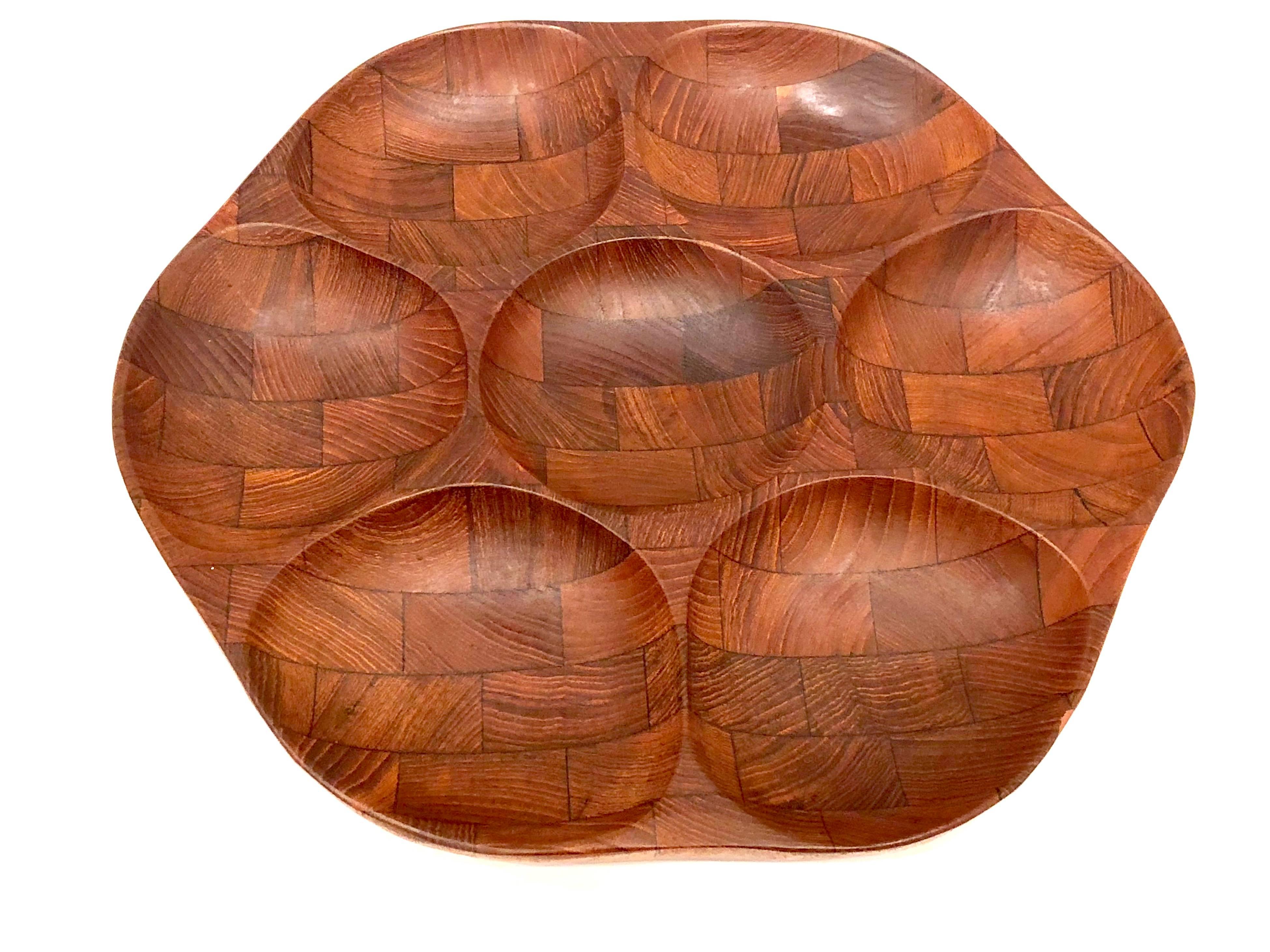 Beautiful simple design on this solid teak thick condiment / nuts tray, circa 1950s. With seven compartment capacity.