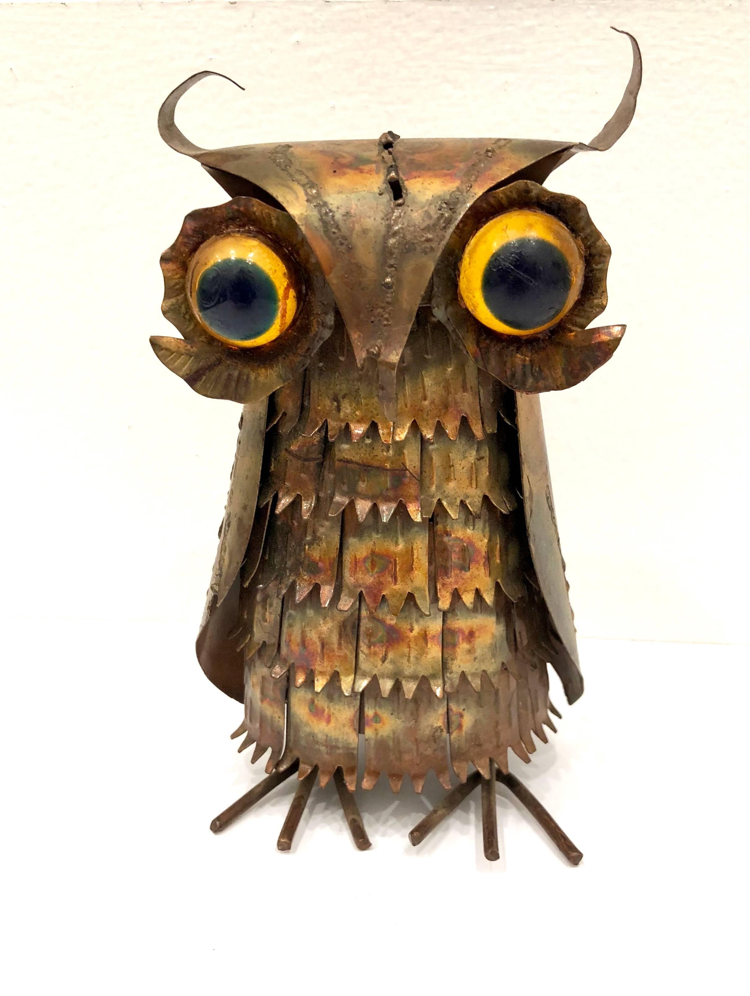 Whimsical metal owl sculpture, hand-sculpted, circa 1970s. With resin eyes.