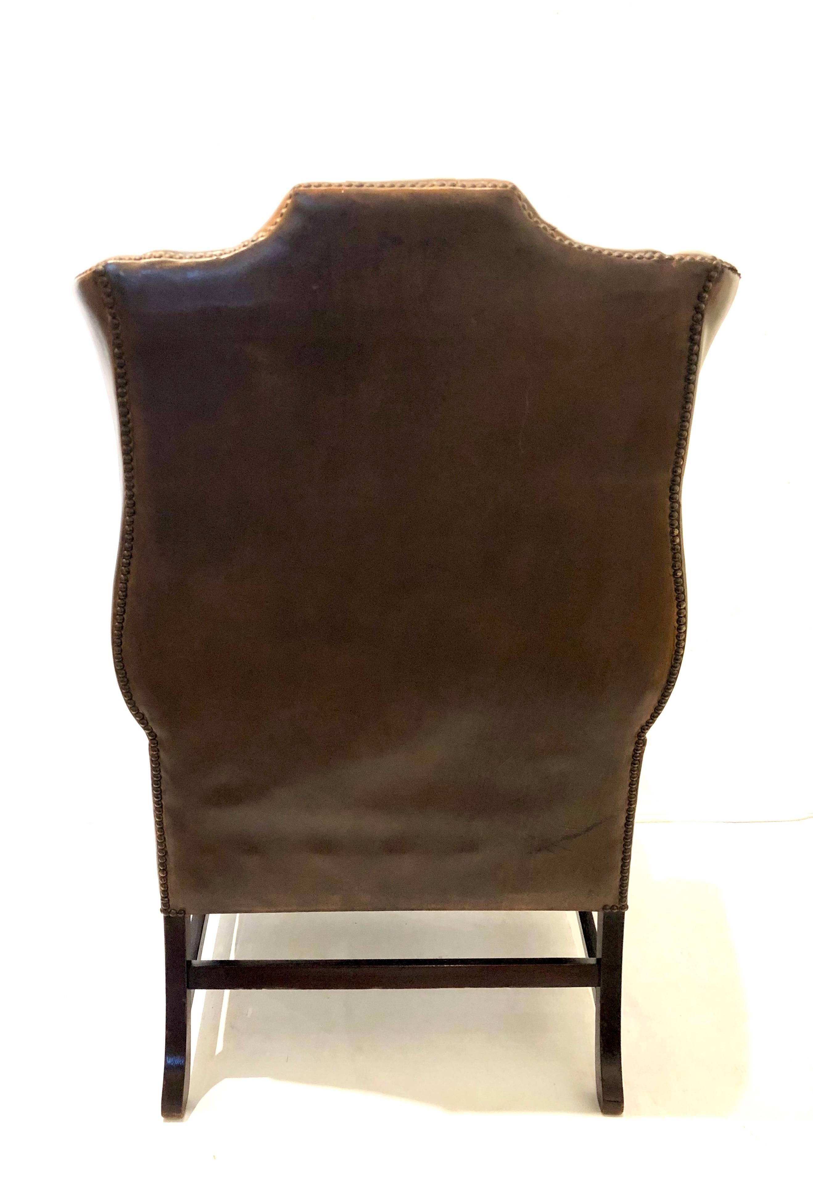 distressed leather wingback chair