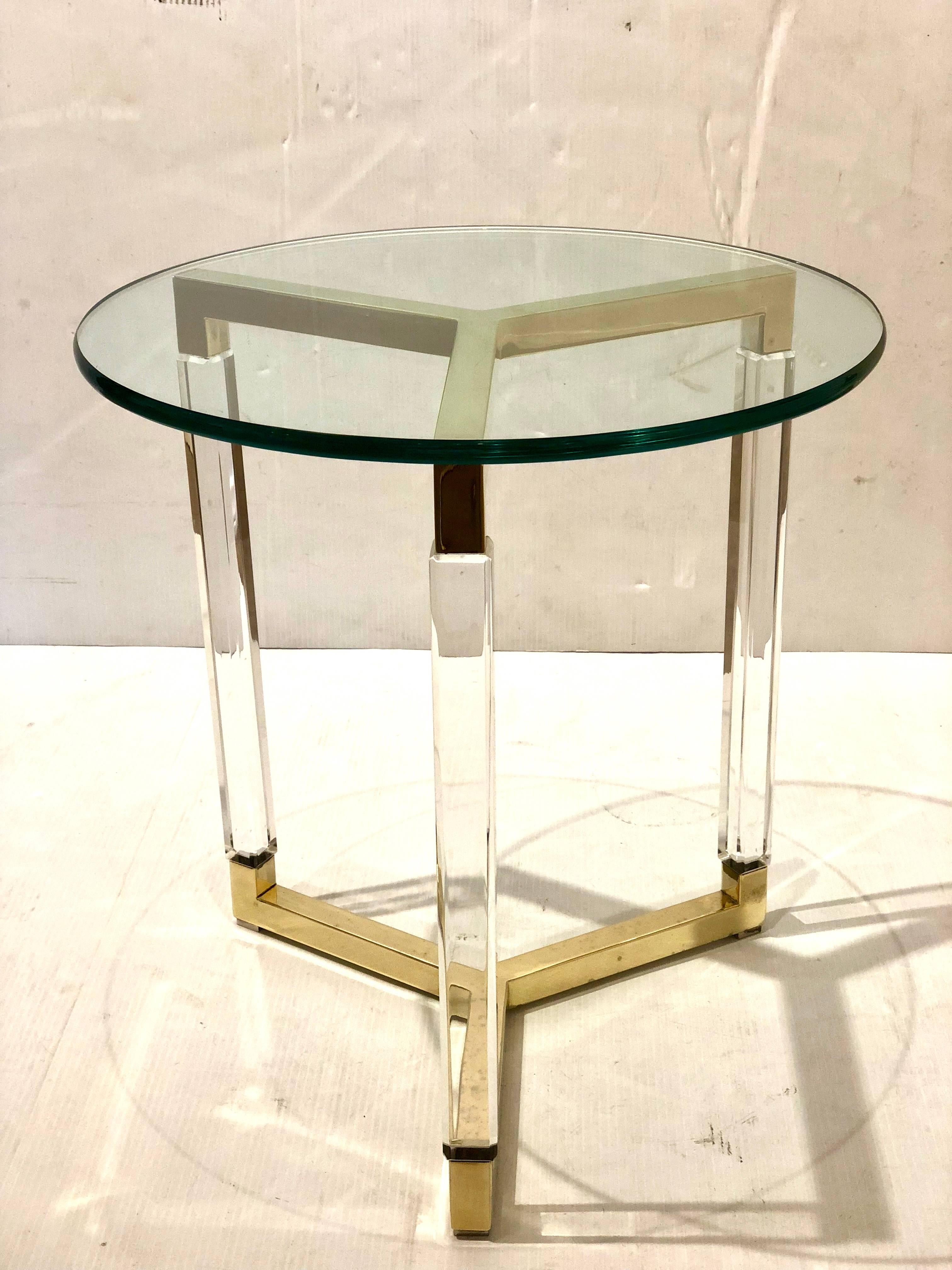 Petite cocktail end table designed by Charles Hollis Jones, part of the metric line in polished brass finish and polished Lucite with a round glass top that can be larger if desired.