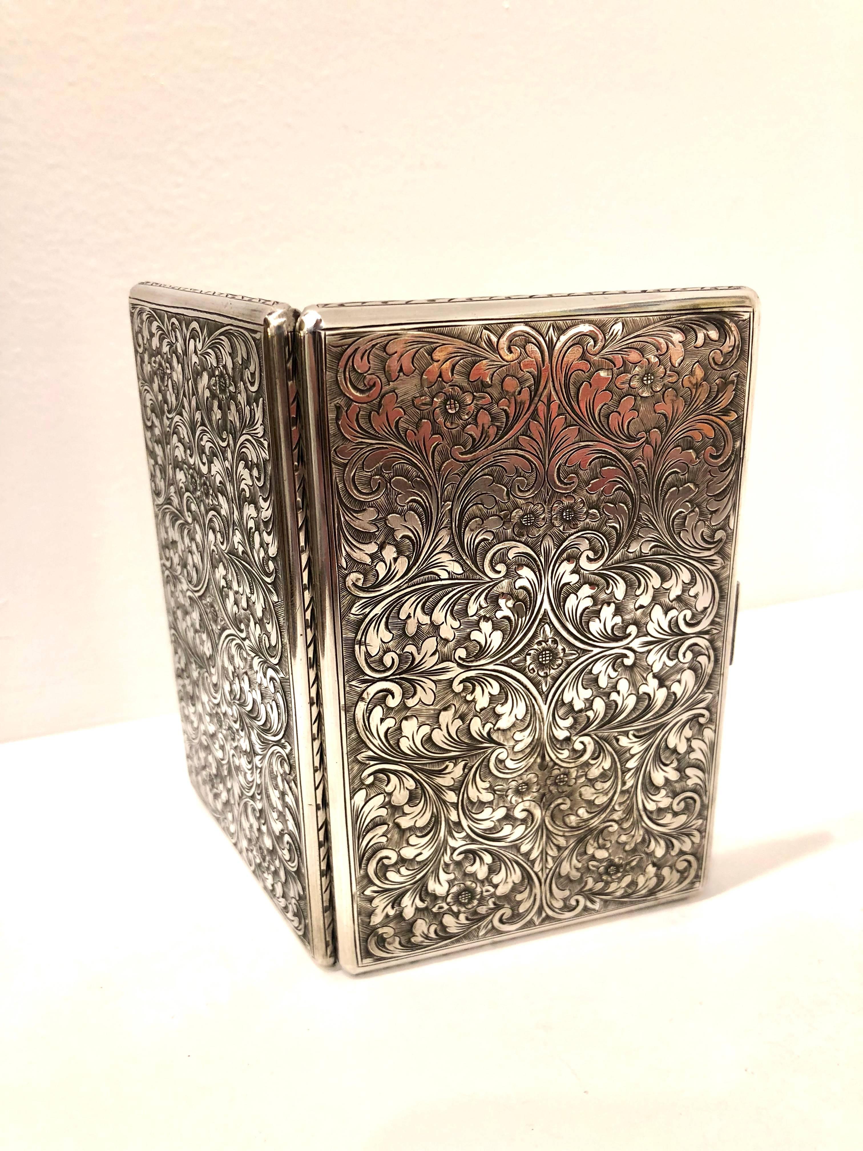 Antique silver stamped cigarette case holder.