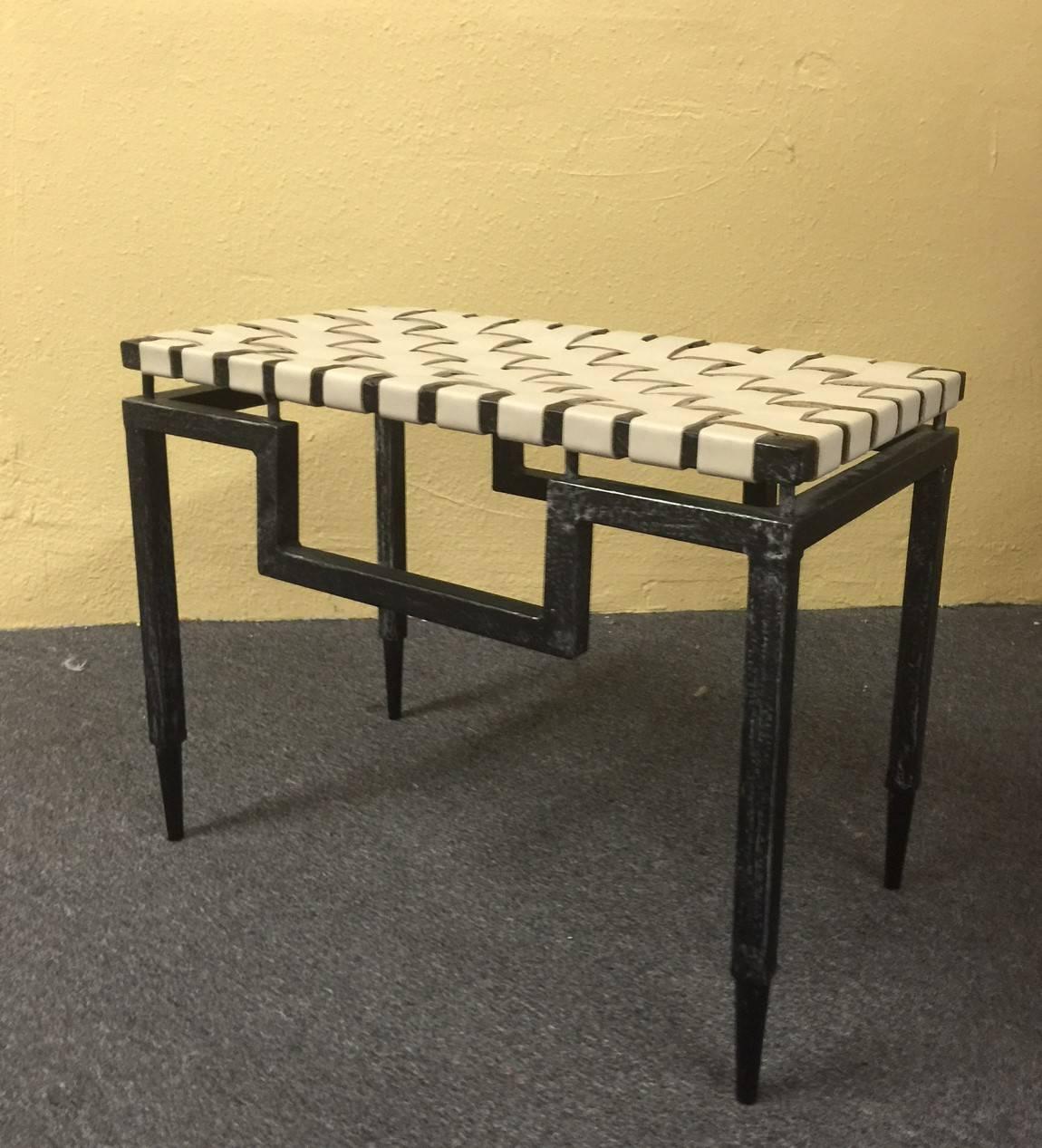 A striking pair of American modern stools made of hammered steel with white leather weaved seats. Solid, heavy and functional, great addition to any room.
