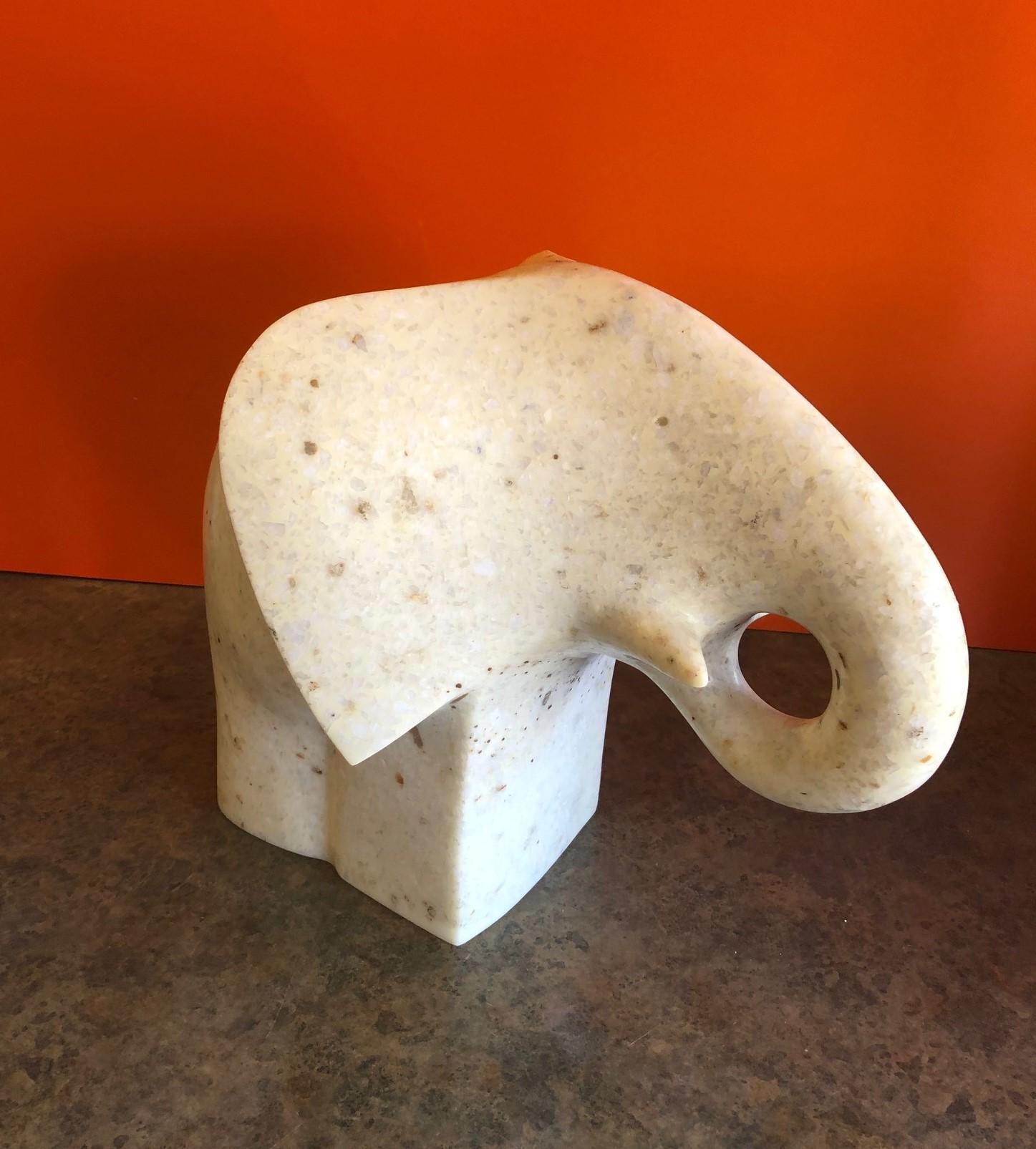 Solid white marble modernist elephant sculpture by Japanese Artist Masatoyo Kishi, circa 1970s. Impressive hand carved sculpture by the listed artist and sculptor who goes by the name 