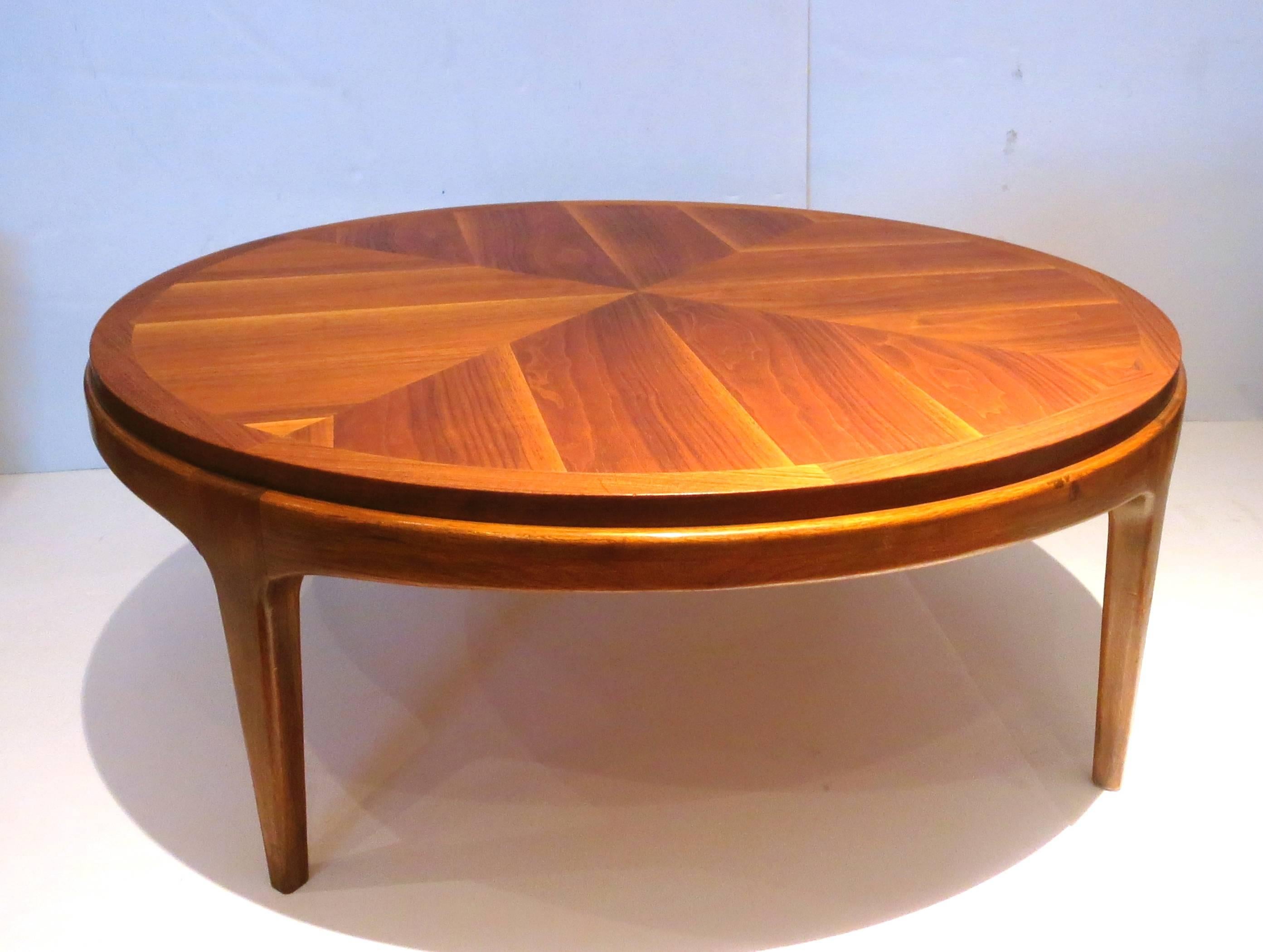 A beautiful walnut round coffee/cocktail table great shape and condition top has been refinished beautiful grain, in solid walnut base with four legs solid and sturdy.