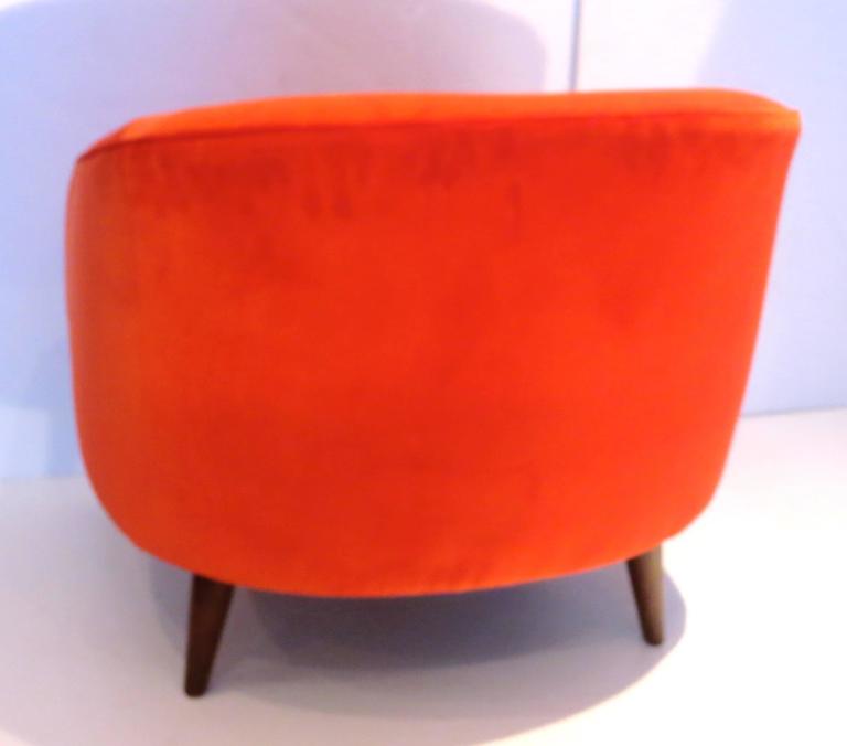 Striking 1950s American modern lounge chair in red velvet fabric at 1stDibs