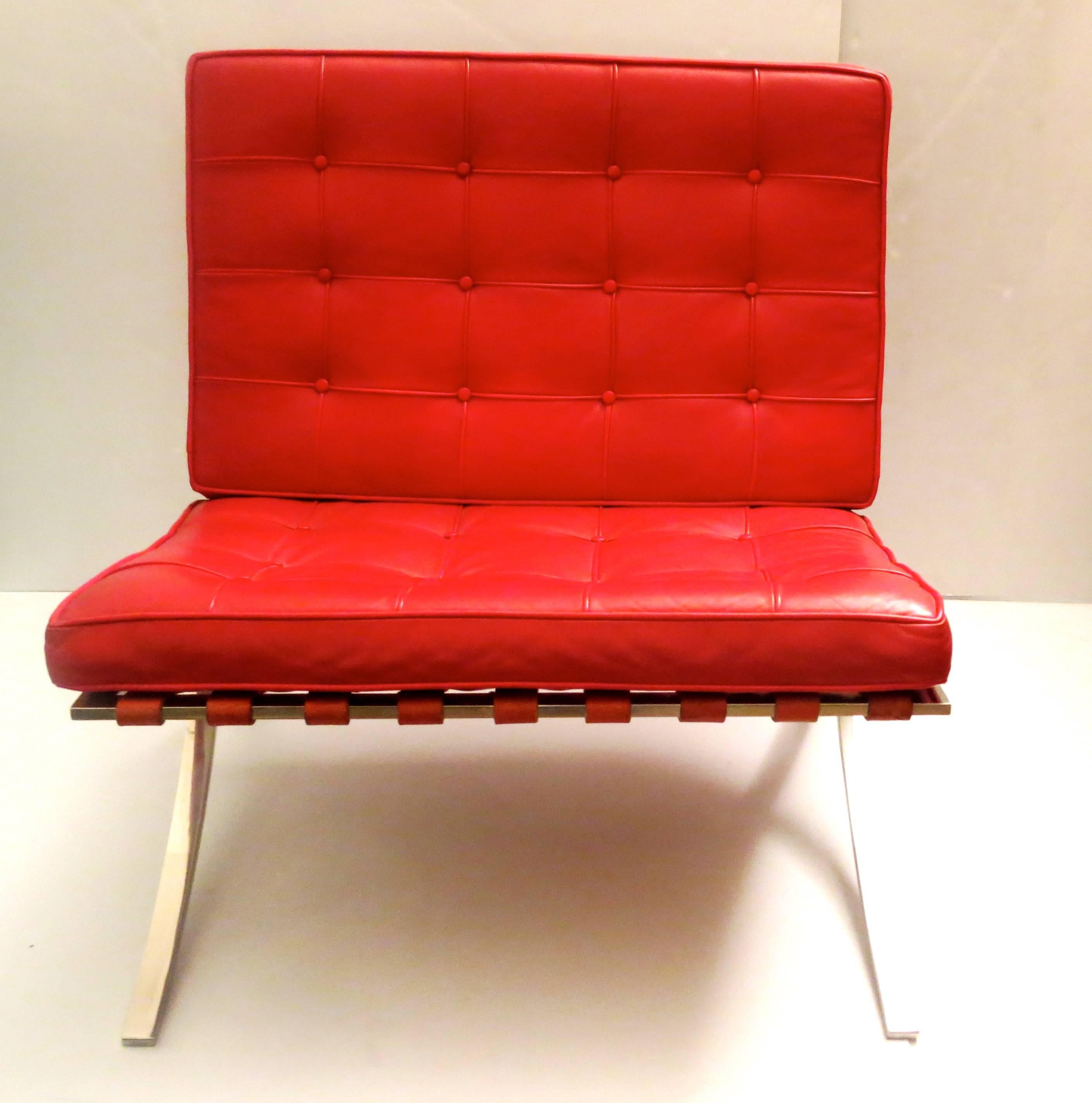 Hard to find pair of Barcelona red leather lounge chairs, design by Mies Van der Rodhe, early production in red leather and polished stainless steel frame, very nice and clean condition, all original some worn and normal wear due to age overall very