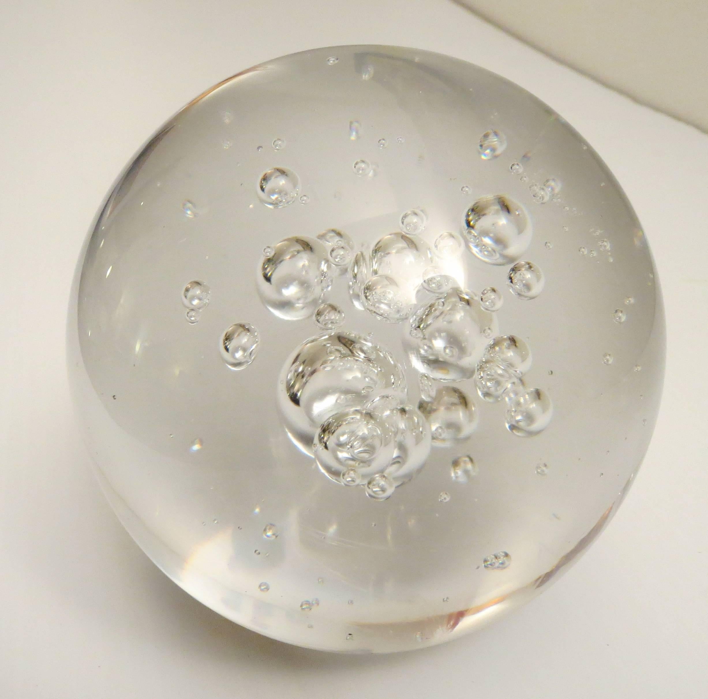 Beautiful and rare Crytal clear bubble ball , by Cartier retains its original foil label great condition no chips or cracks , with a flat side to keep it in place.can be used as a center piece or paperweight.